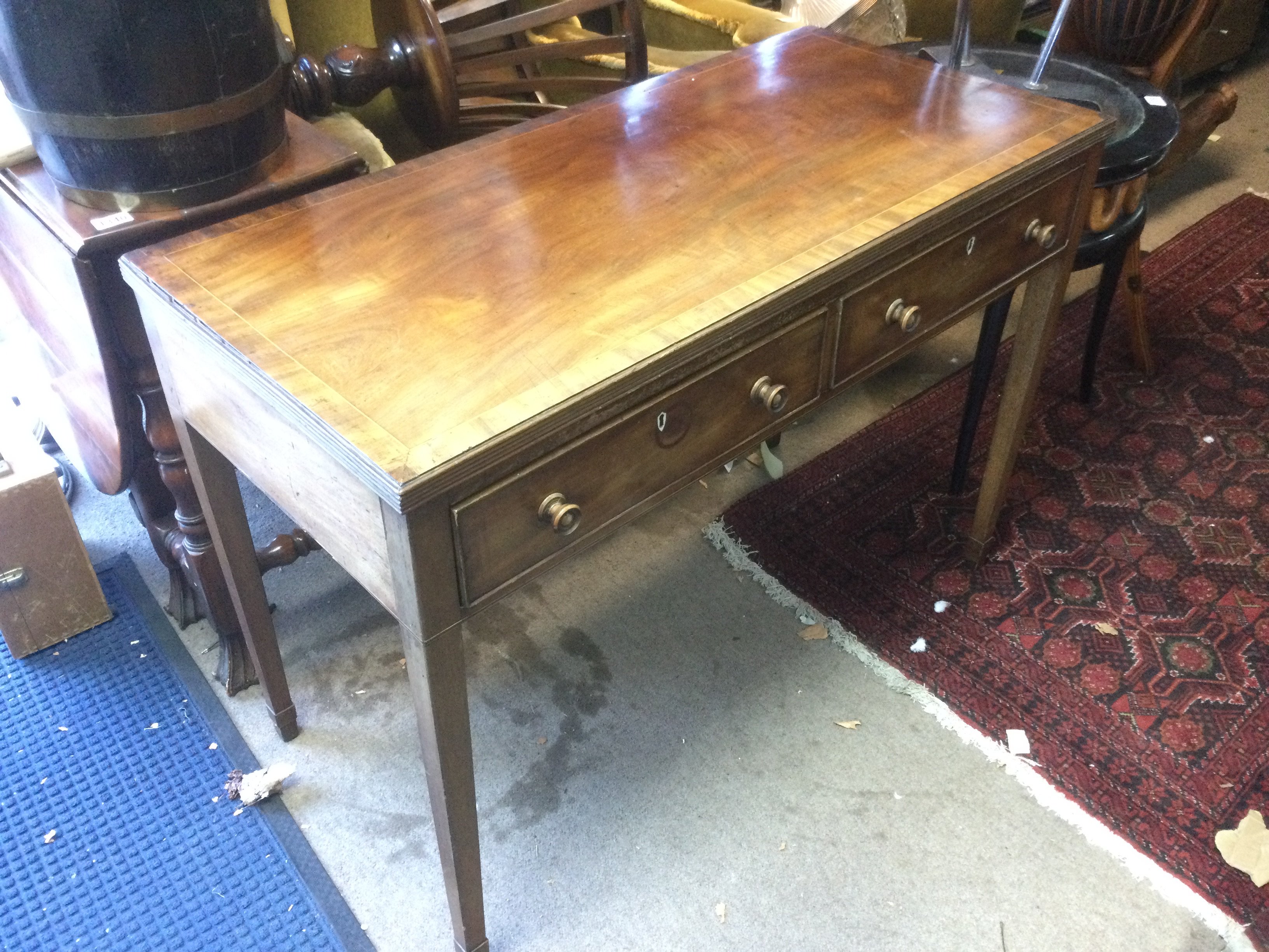 An Edwardian inlaid mahogany side table, approx 98cm x 50cm x 76cm. Shipping category D.