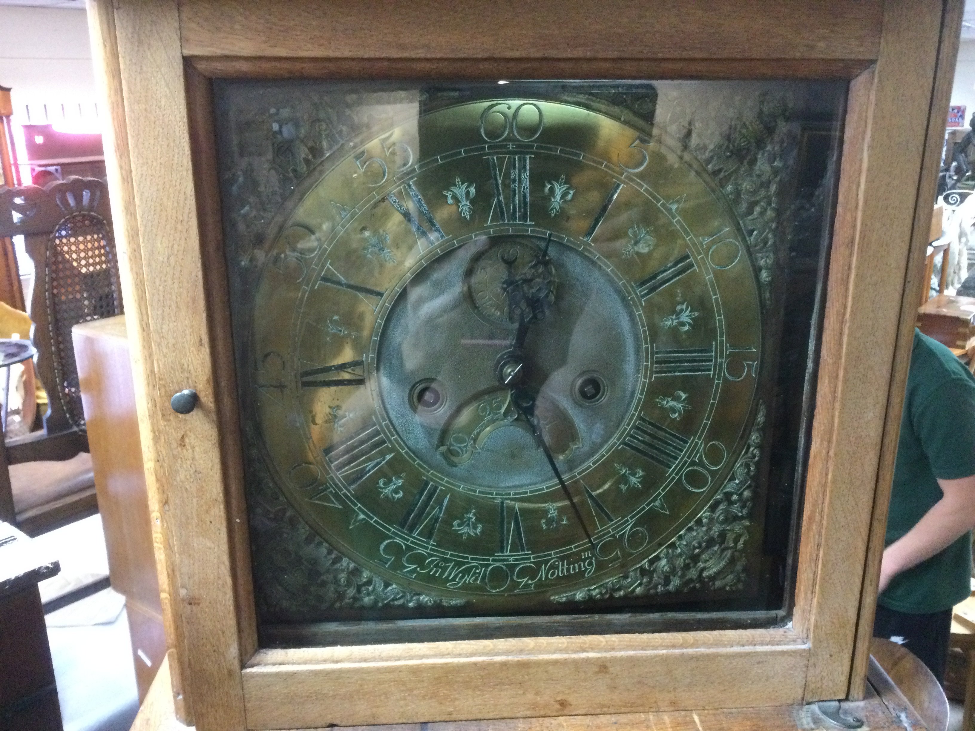 An oak eight day long cased clock. Shipping category D.
