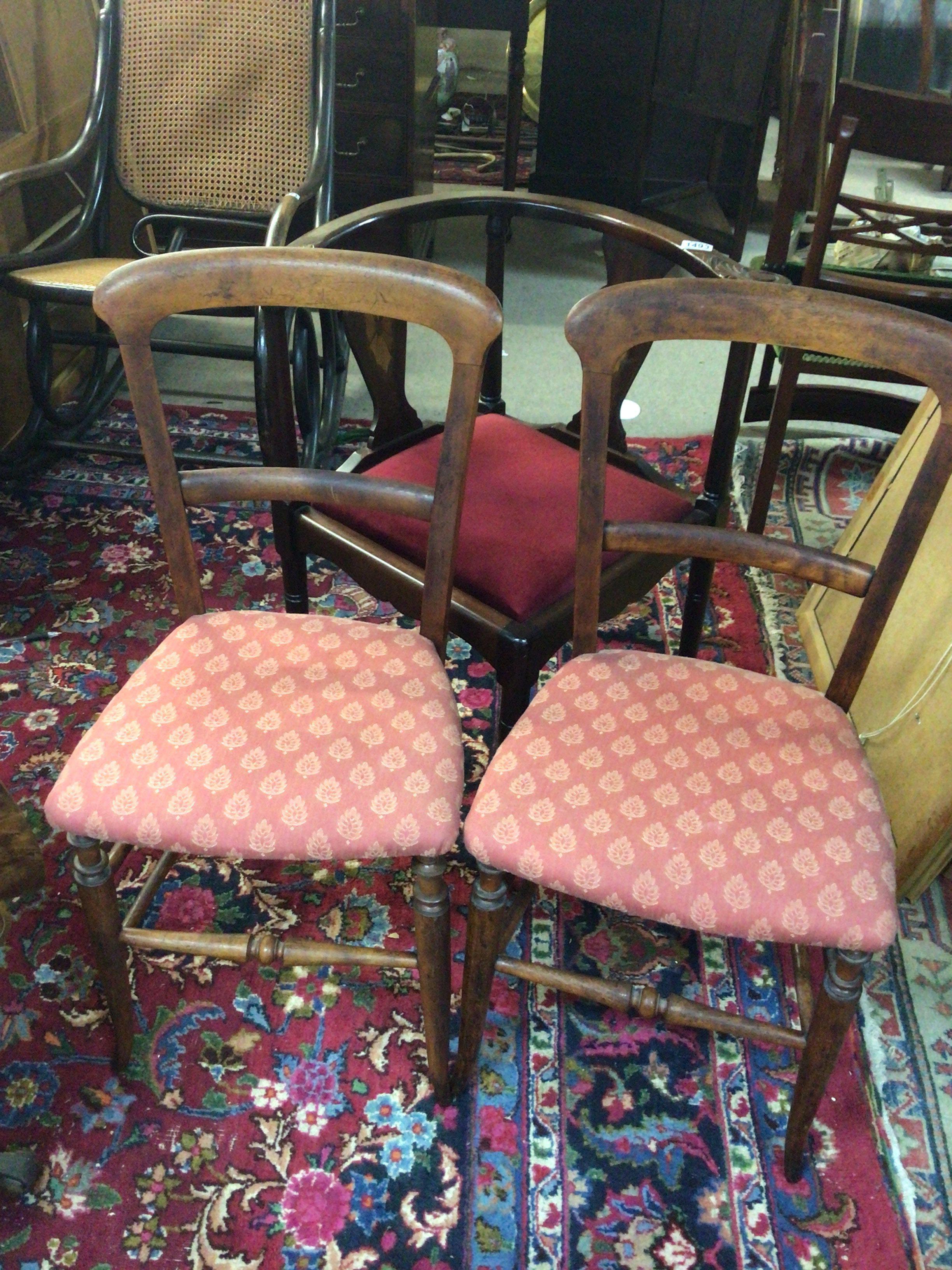 An Edwardian carved and inlaid corner chair and two bedroom chairs (3)