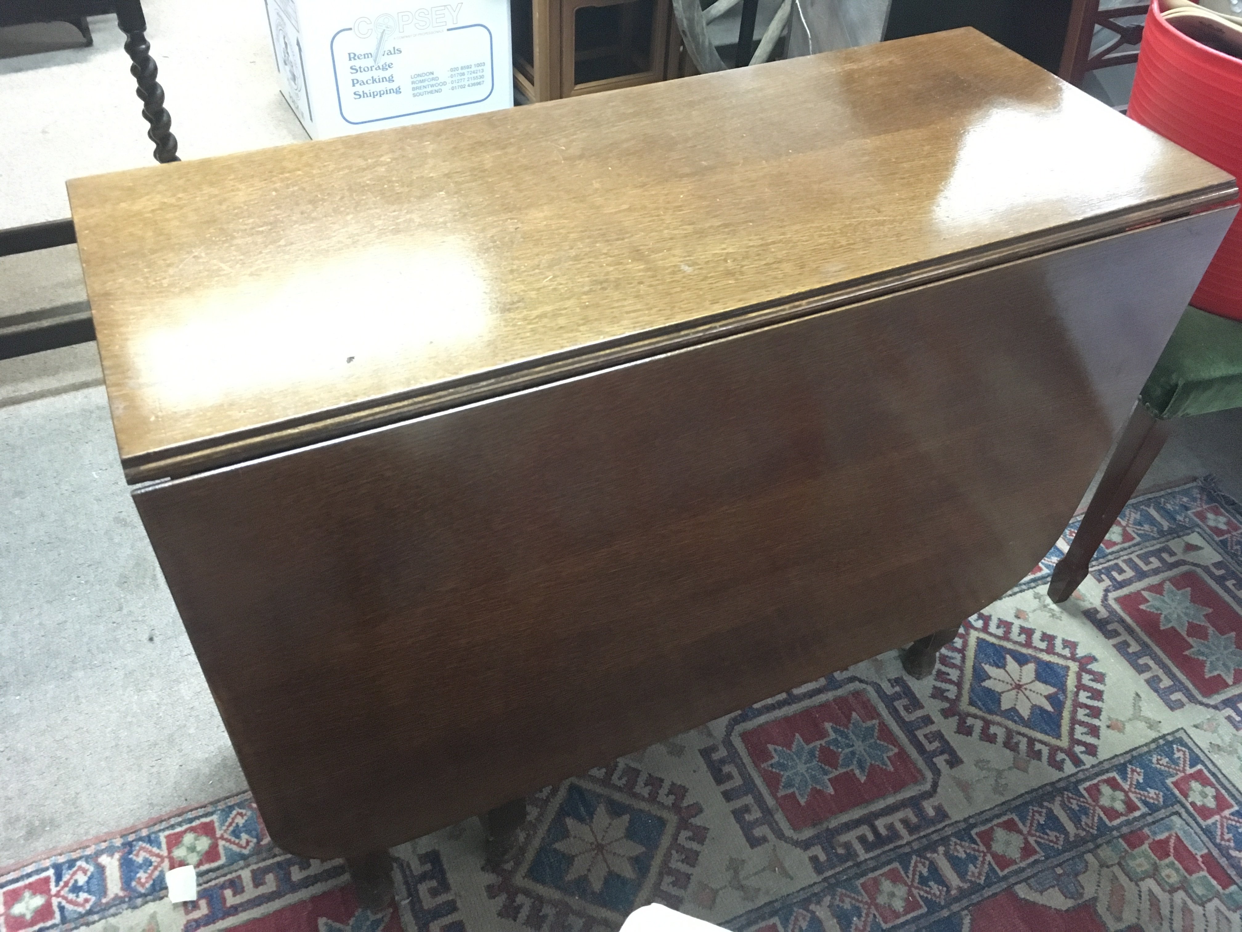 WITHDRAWN - A modern glass with gilt wrought iron frame, 168cm wide 82cm tall - No Reserve