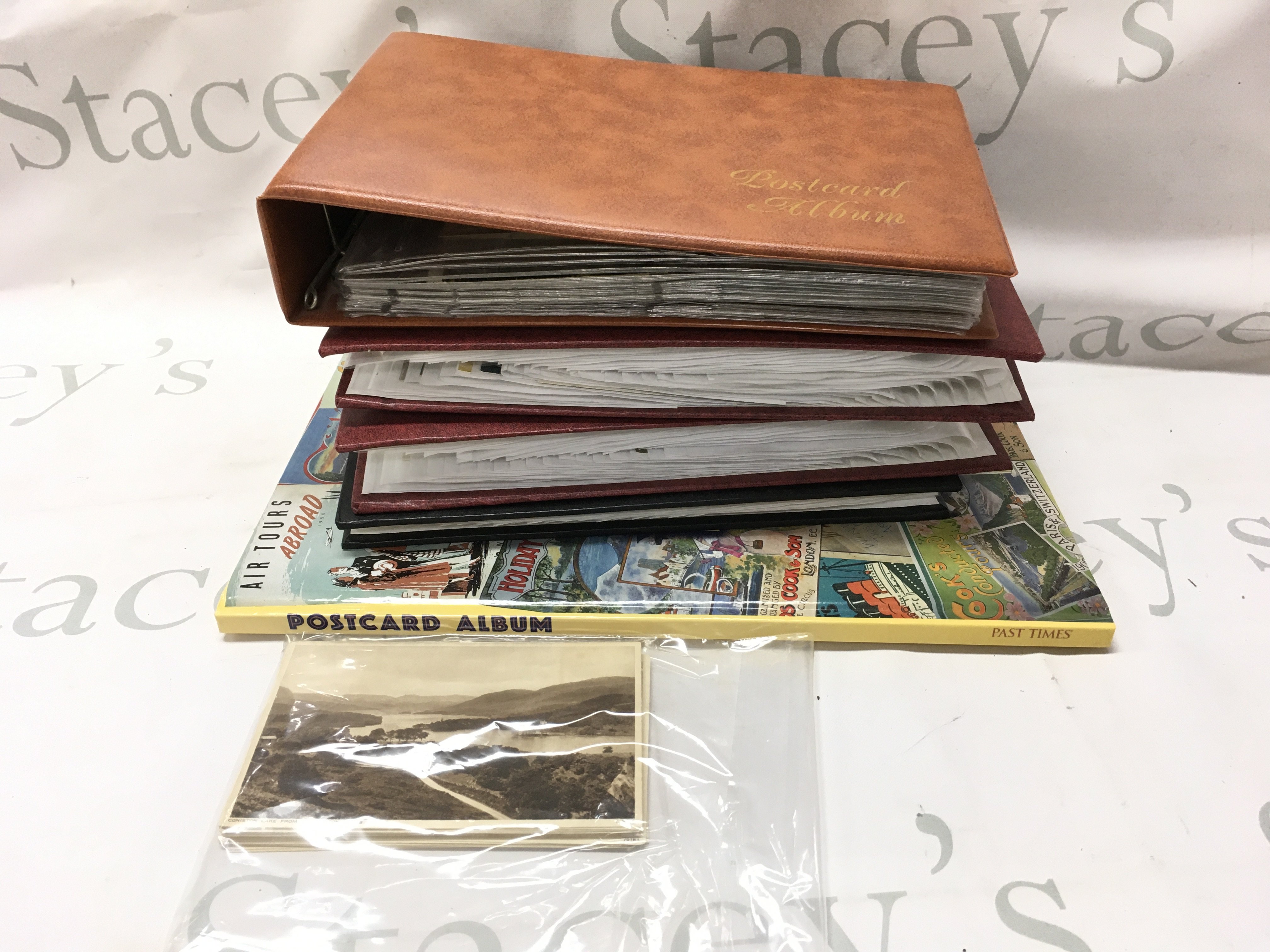 A collection of postcards in albums and some loose cards . Postage category B