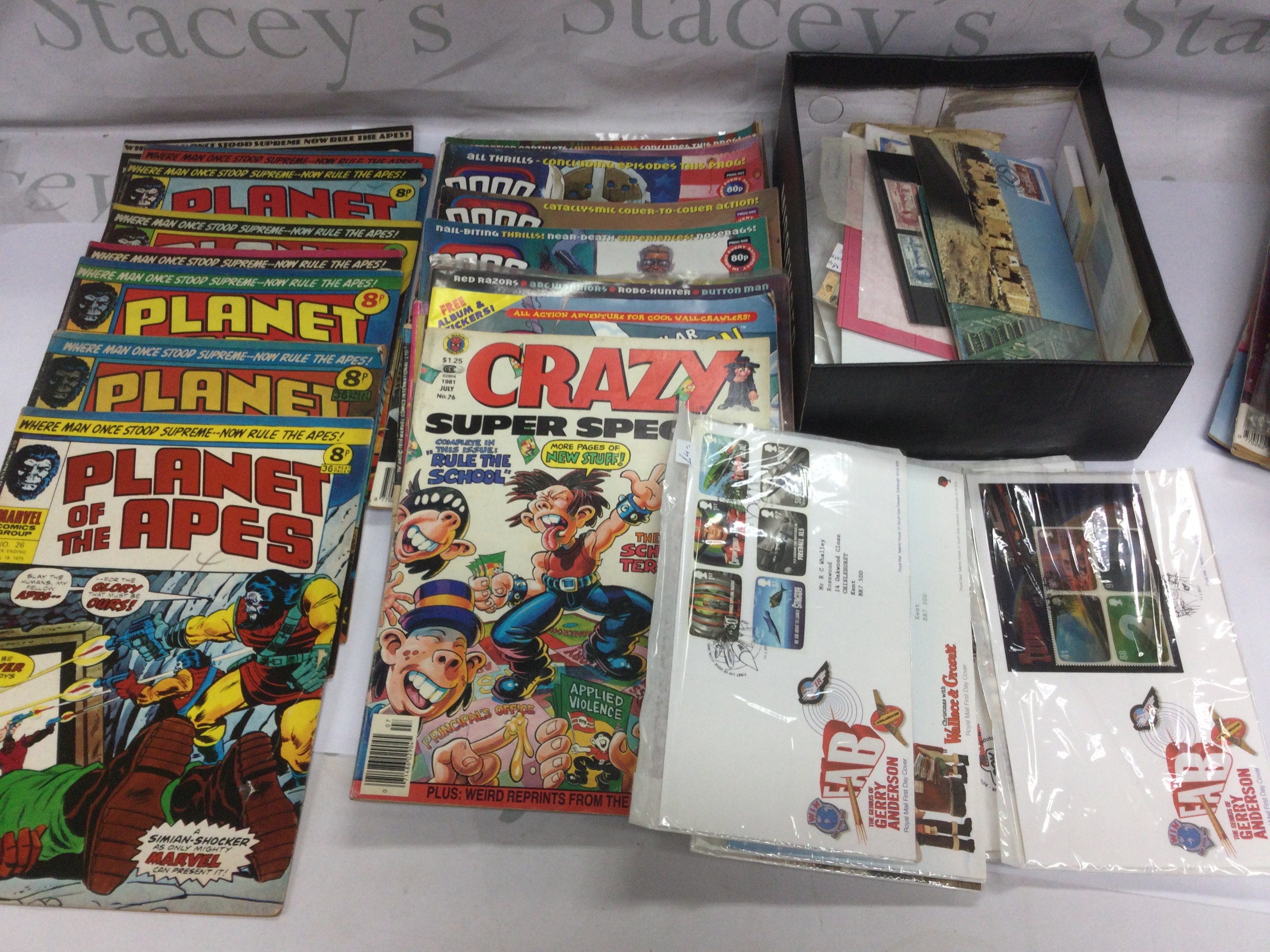 A collection of vintage Marvel comics including a No.2 Planet Of The Apes, Flight magazines plus a small collection of stamps and first day covers. Shipping category D.- NO RESERVE