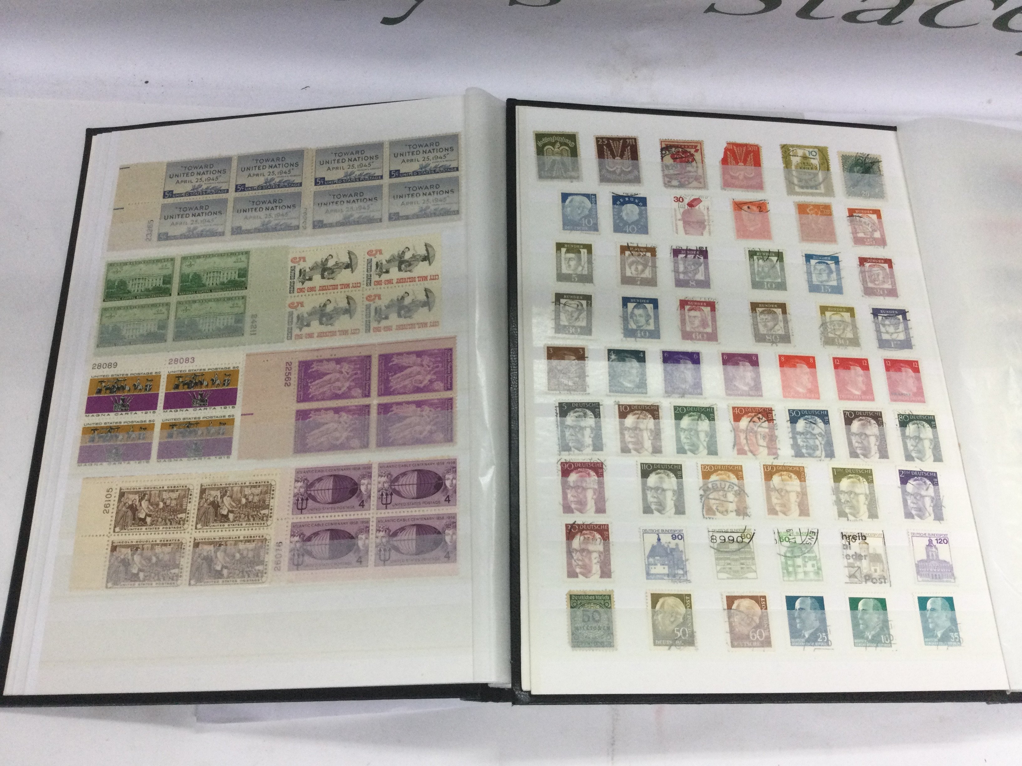 WITHDRAWN - Two boxes of mixed world stamps and first day covers. Shipping category D. NO RESERVE