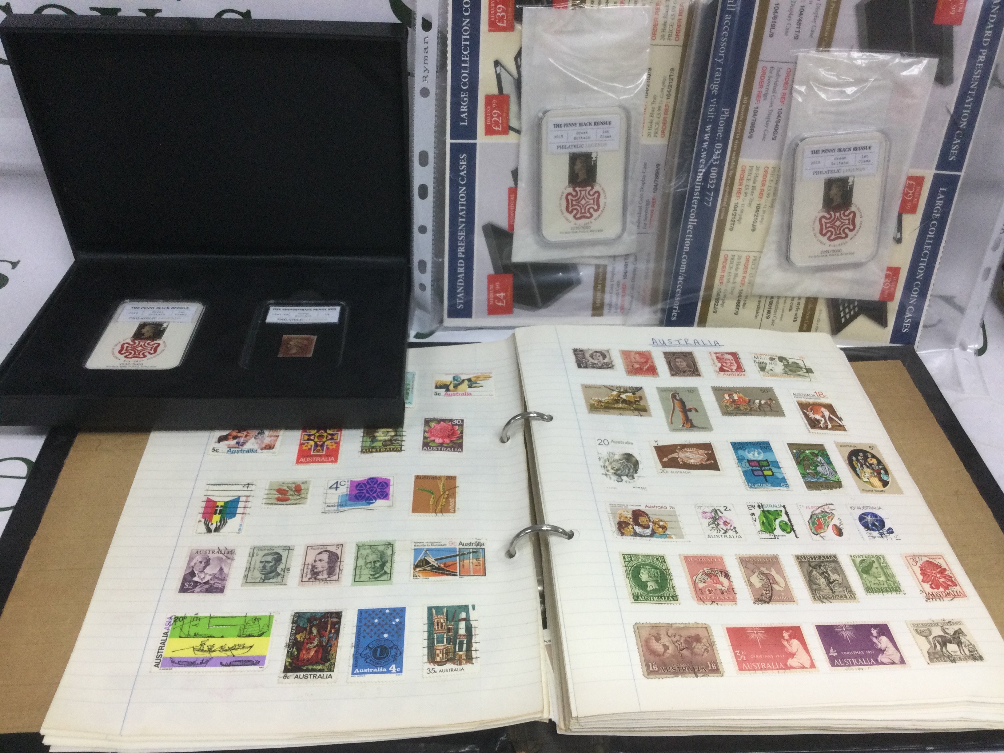 A collection of commemorative presentation packs and others, stamps including two albums of world stamps etc.