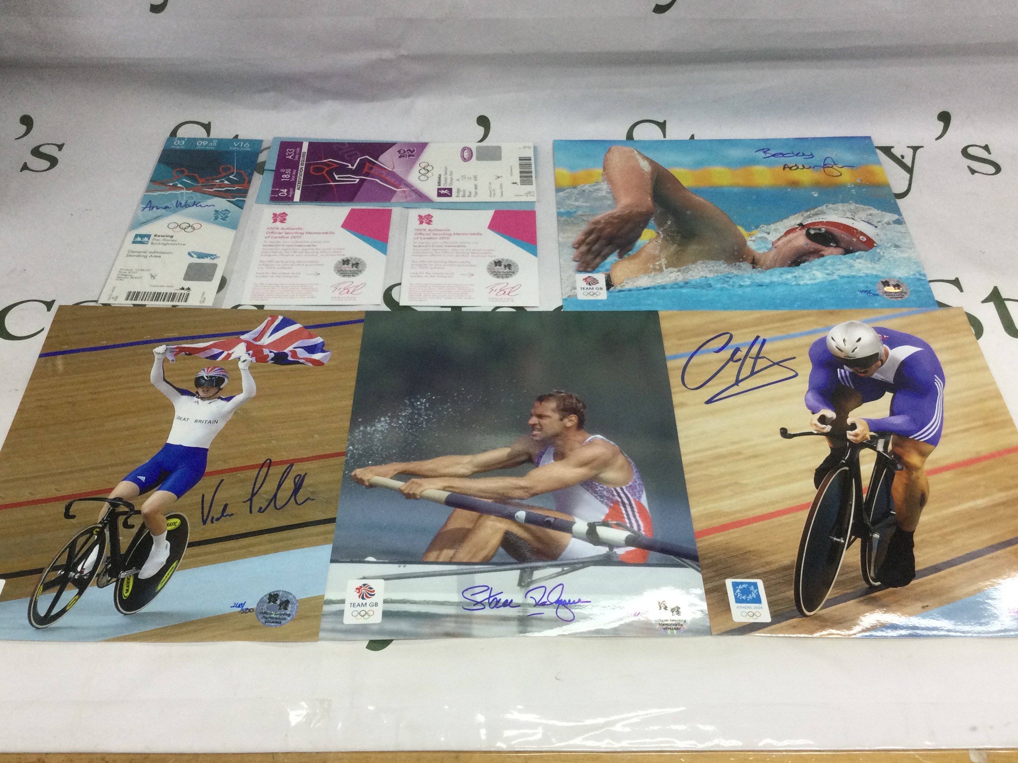 A small collection of signed GB Olympic memorabilia comprising tickets and photos. Names include Steve Redgrave, Chris Hoy and others.