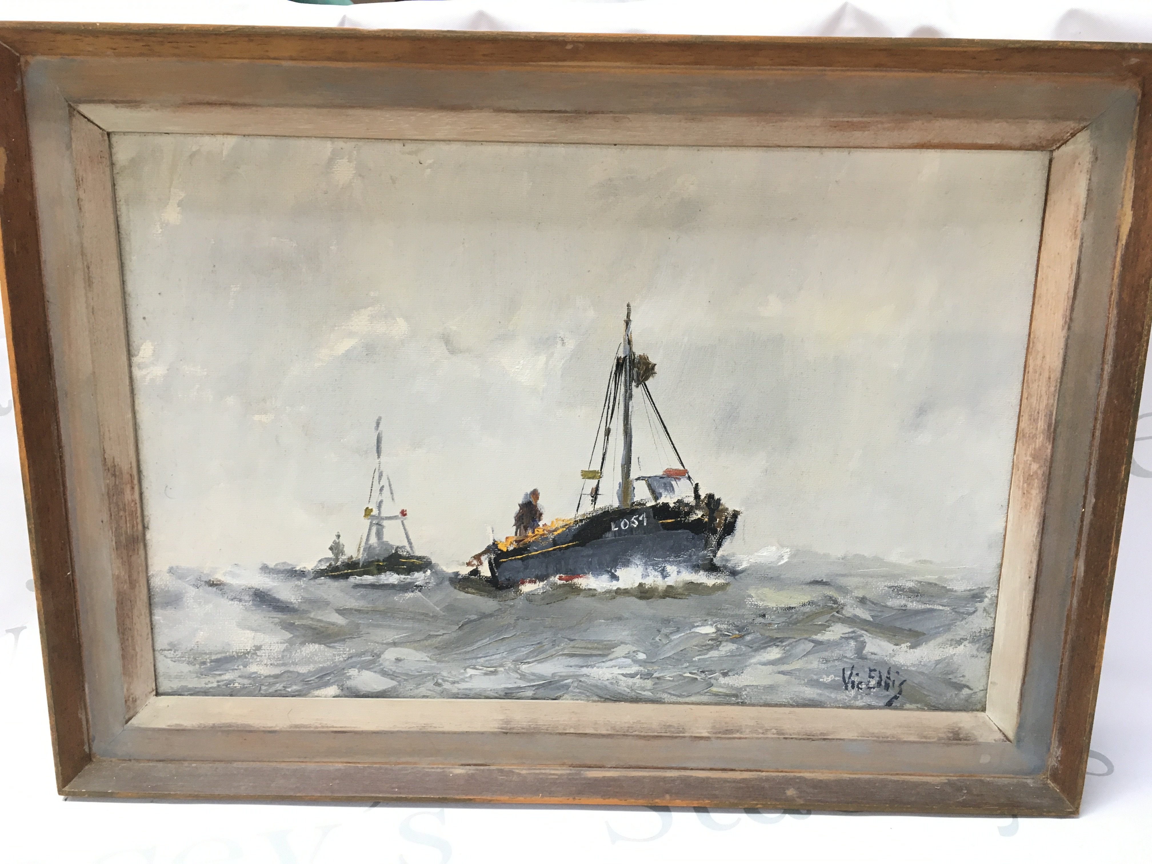 A framed Vic Ellis oil on canvas painting of a steam boat.