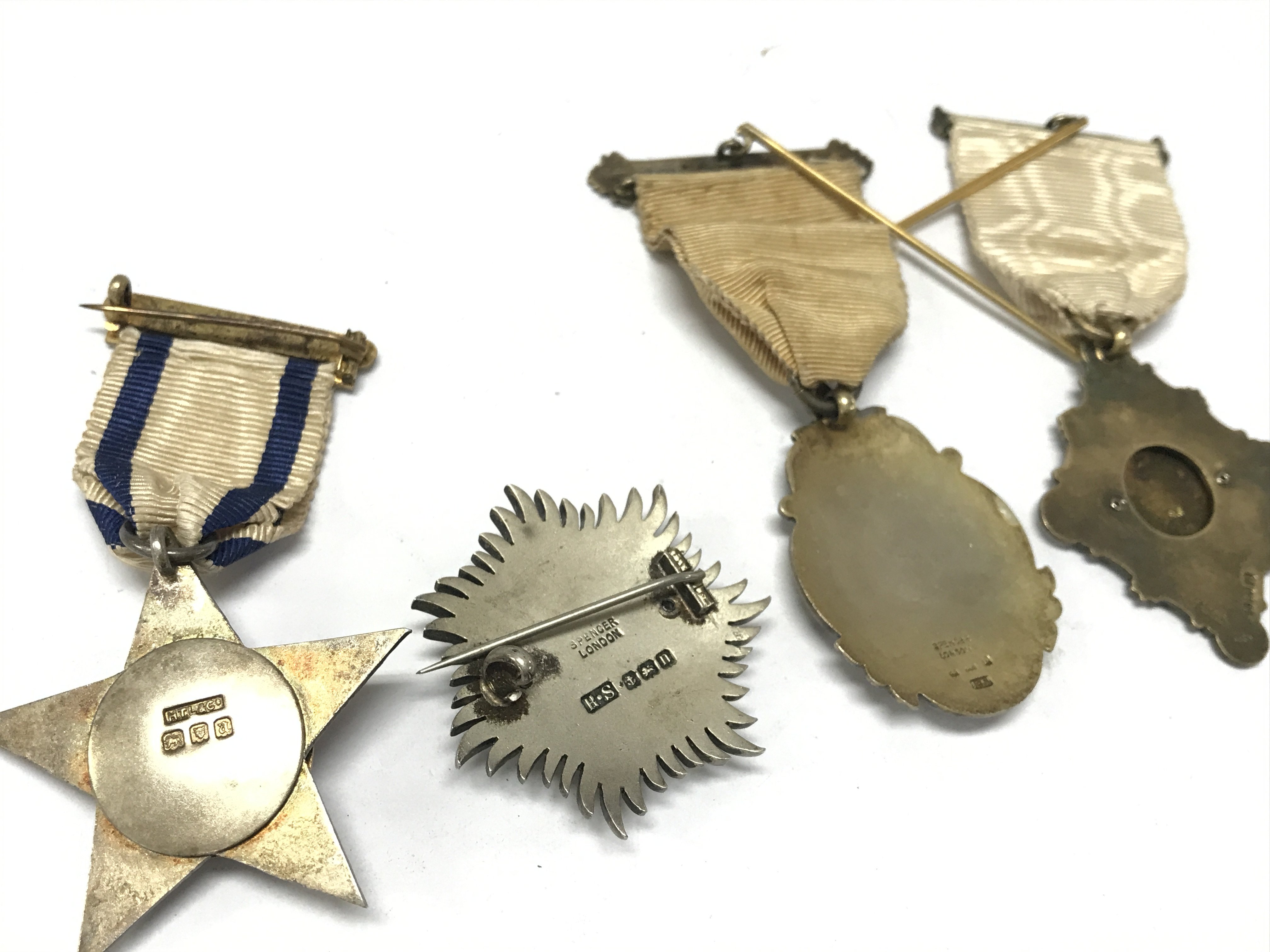 Four early 20th century silver and enamel Masonic stewards jewels including 1902 Edward VII coronation a quantity silver and enamel badge 1913 and two others dated 1917 & 1920. Postage category A