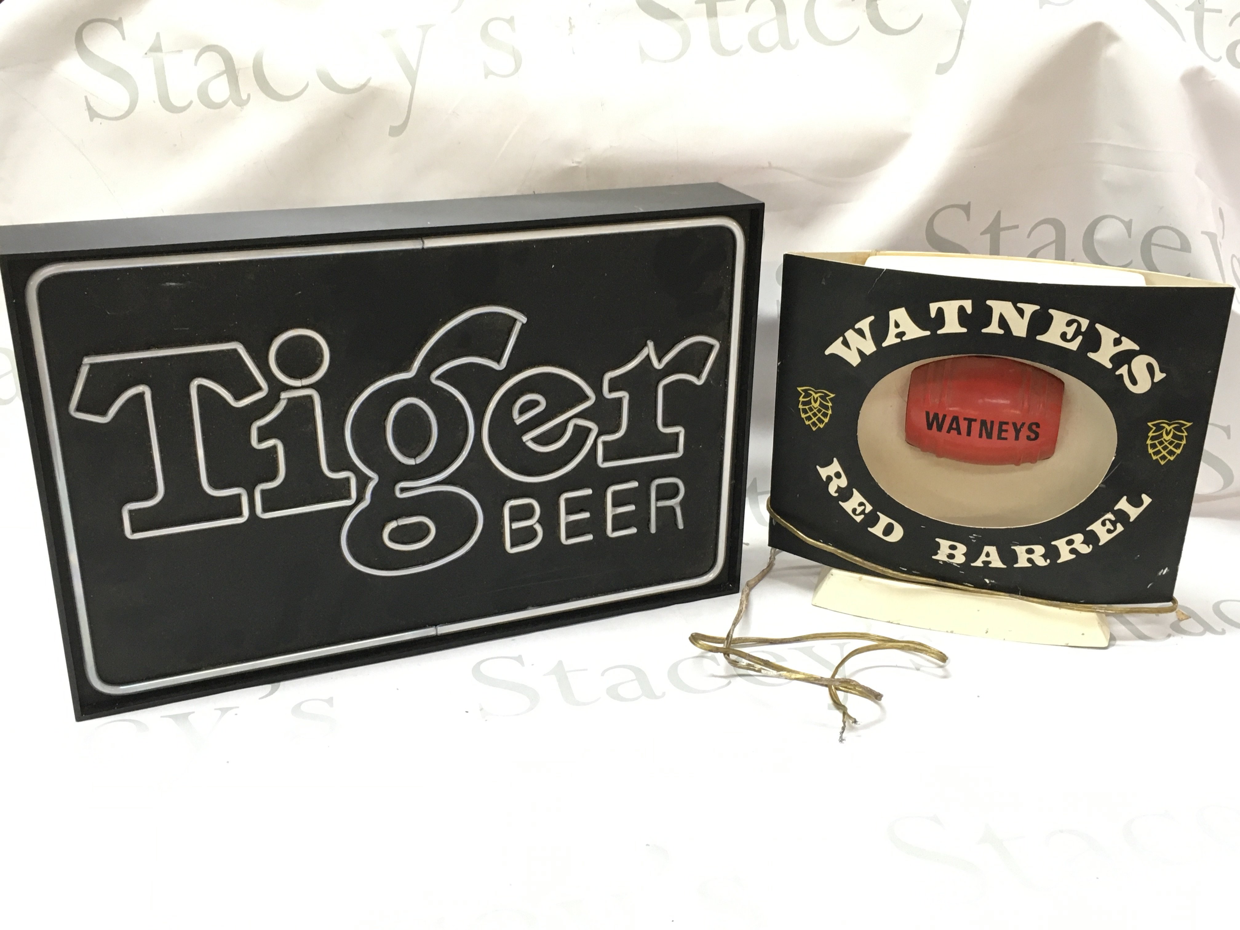 Tiger beer light up neon advertising sign and a Watneys red barrel light up sign . Postage category C
