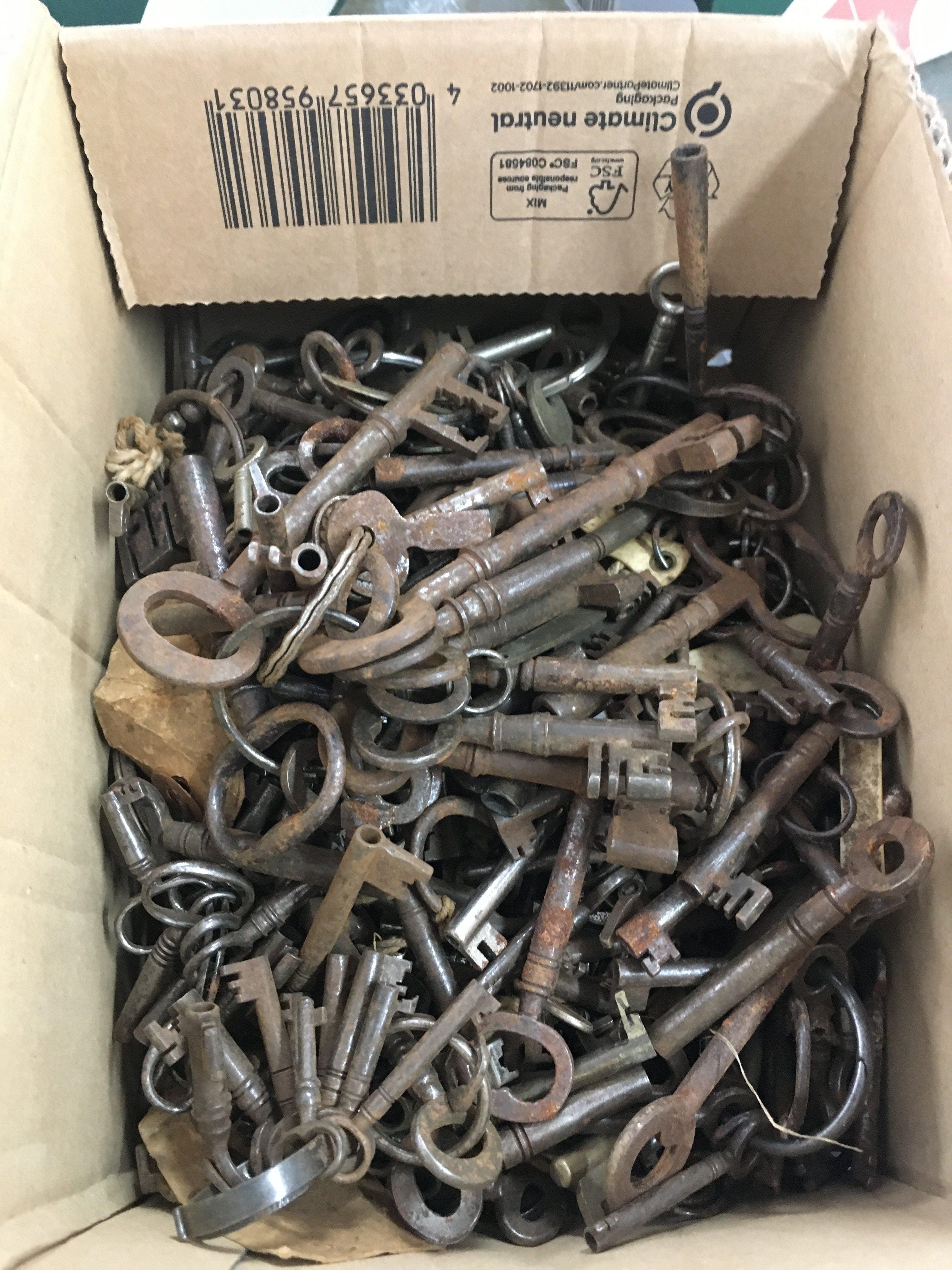 A collection of old keys . Postage catB