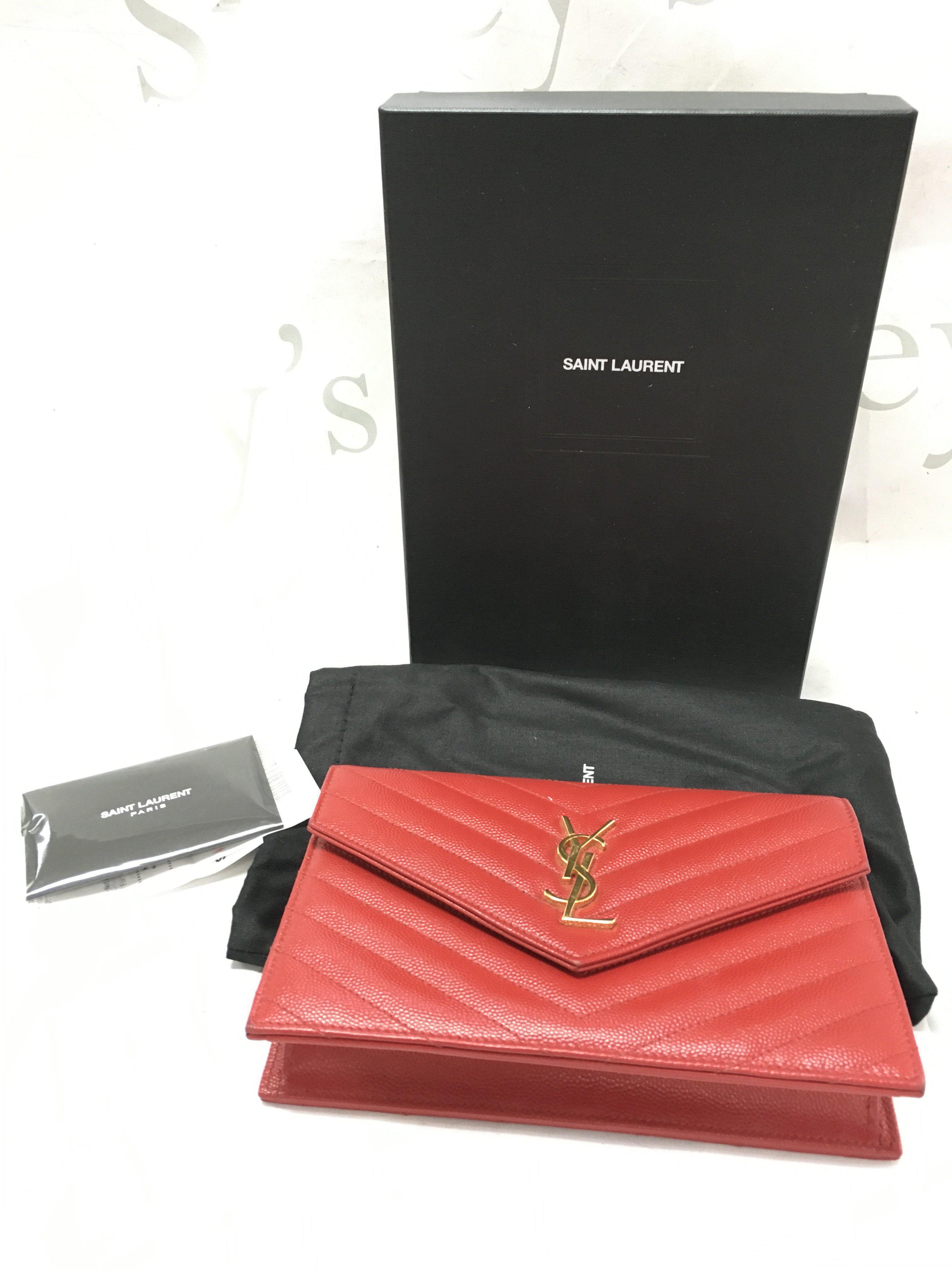 A boxed Saint Laurent Red Grain De Powder Matelasse wallet on chain bag with certificate, receipt and dust bag