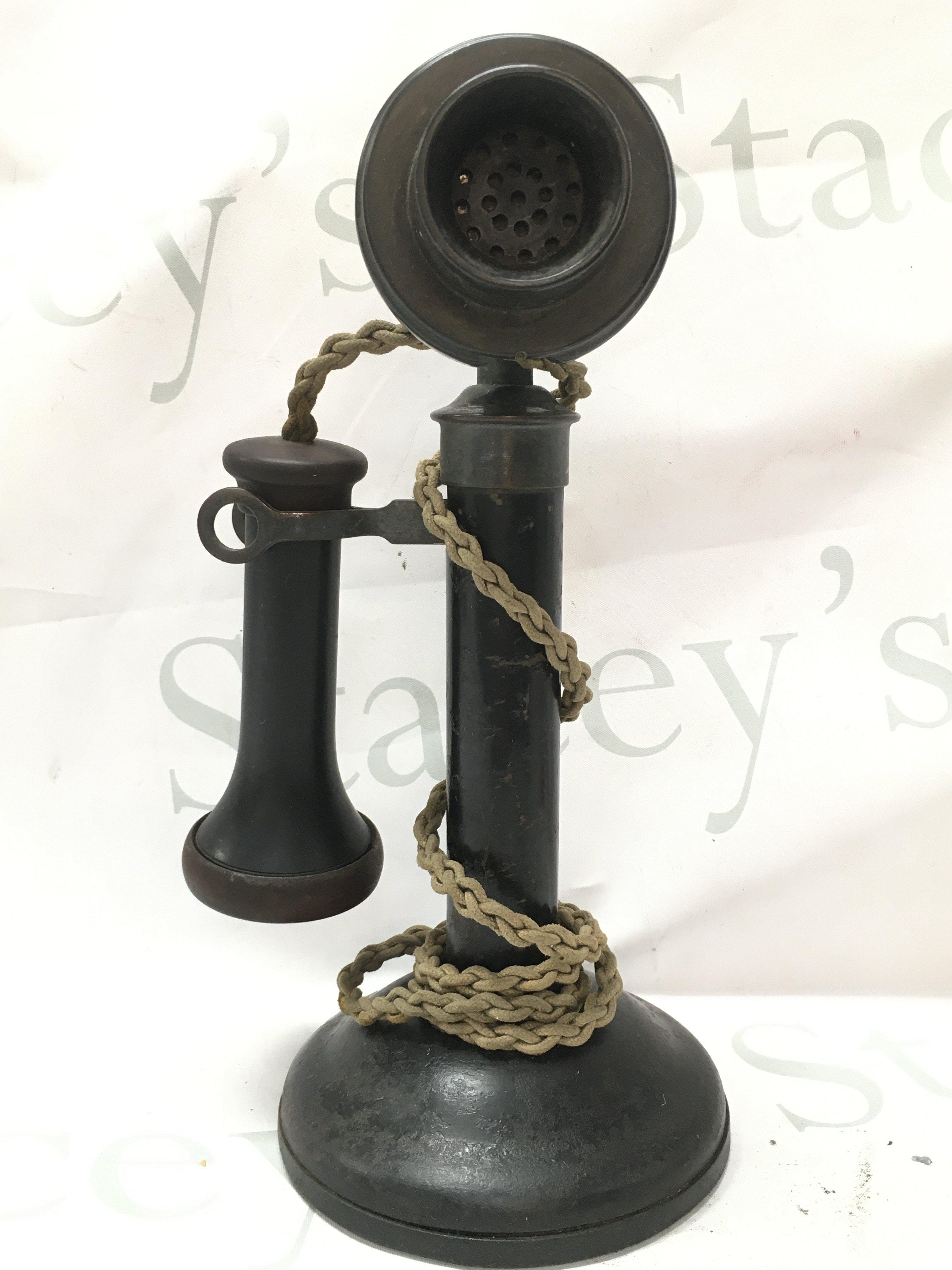 A vintage stick telephone , 30cm tall. Postage category B