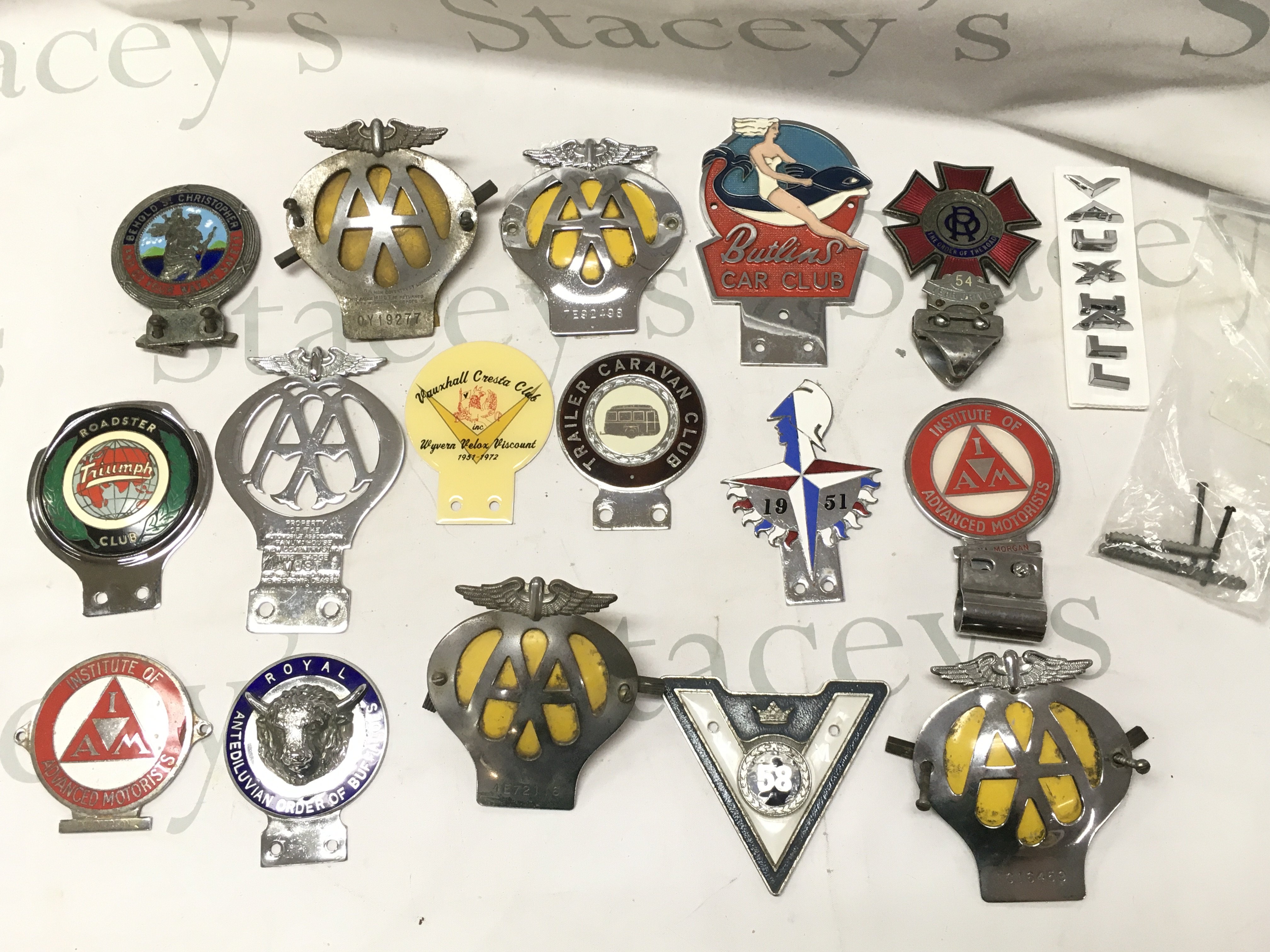 A collection of vintage motorist badges including Triumph, Butlins Car Club, Order of the road, Jaguar Drivers club, veteran motorists Etc. Postage category B