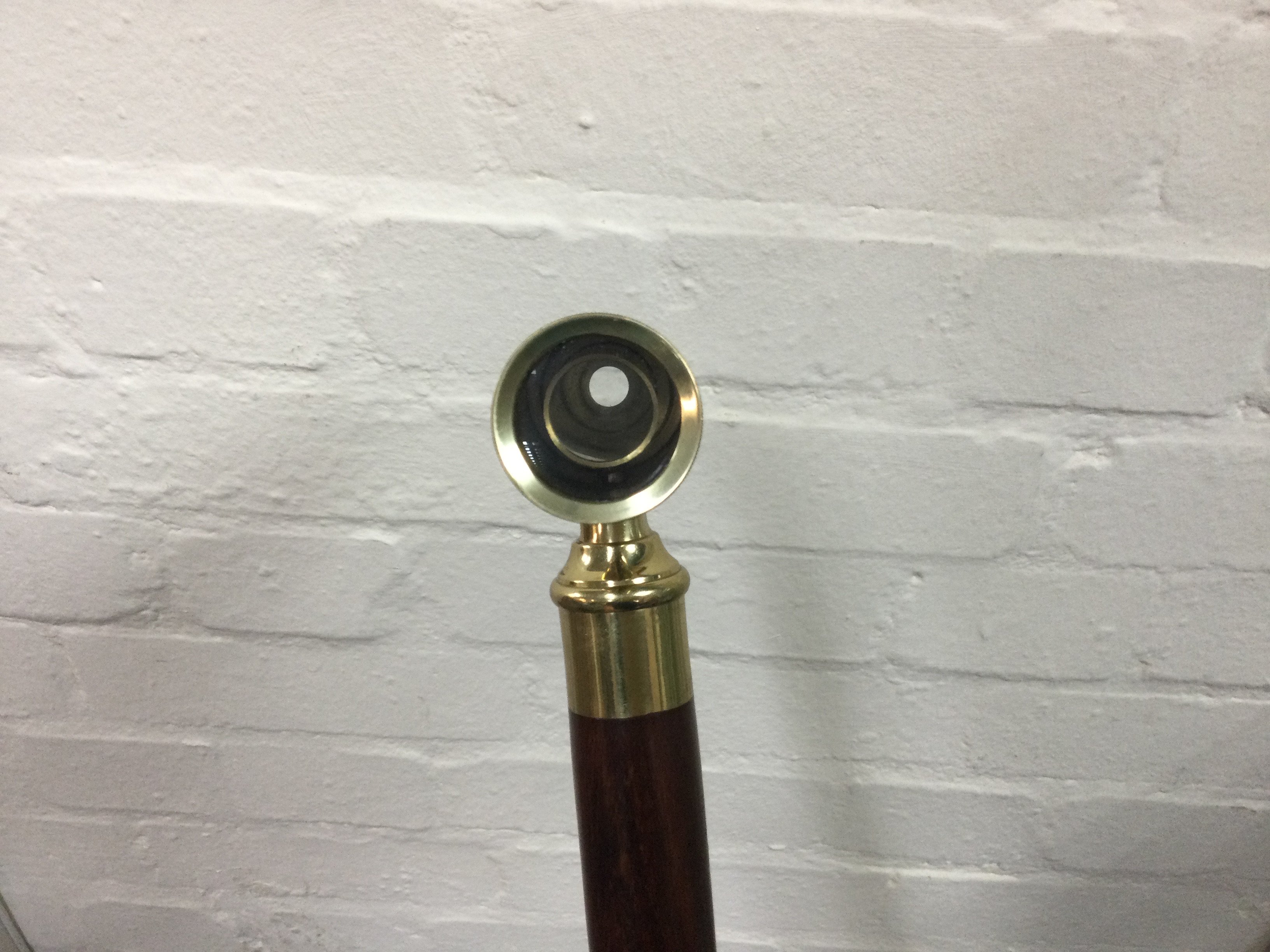 A Walking stick with novelty telescope top. 90cm long. NO RESERVE