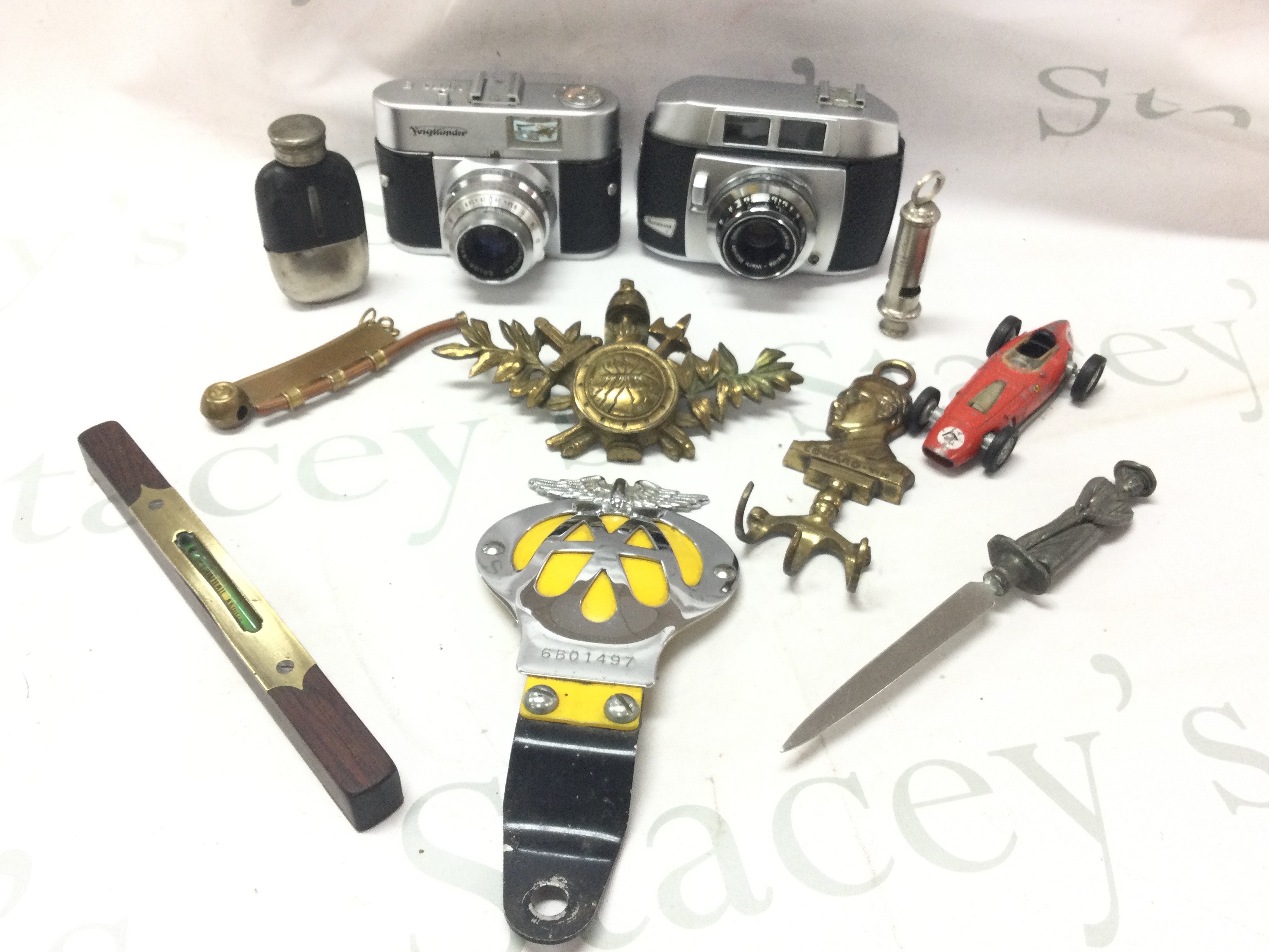 Two vintage cameras Voigtlander Vito B and a Baldessa I , AA badge, various collectables, ARP whistle, Edward VIII coat hook etc. postage category B