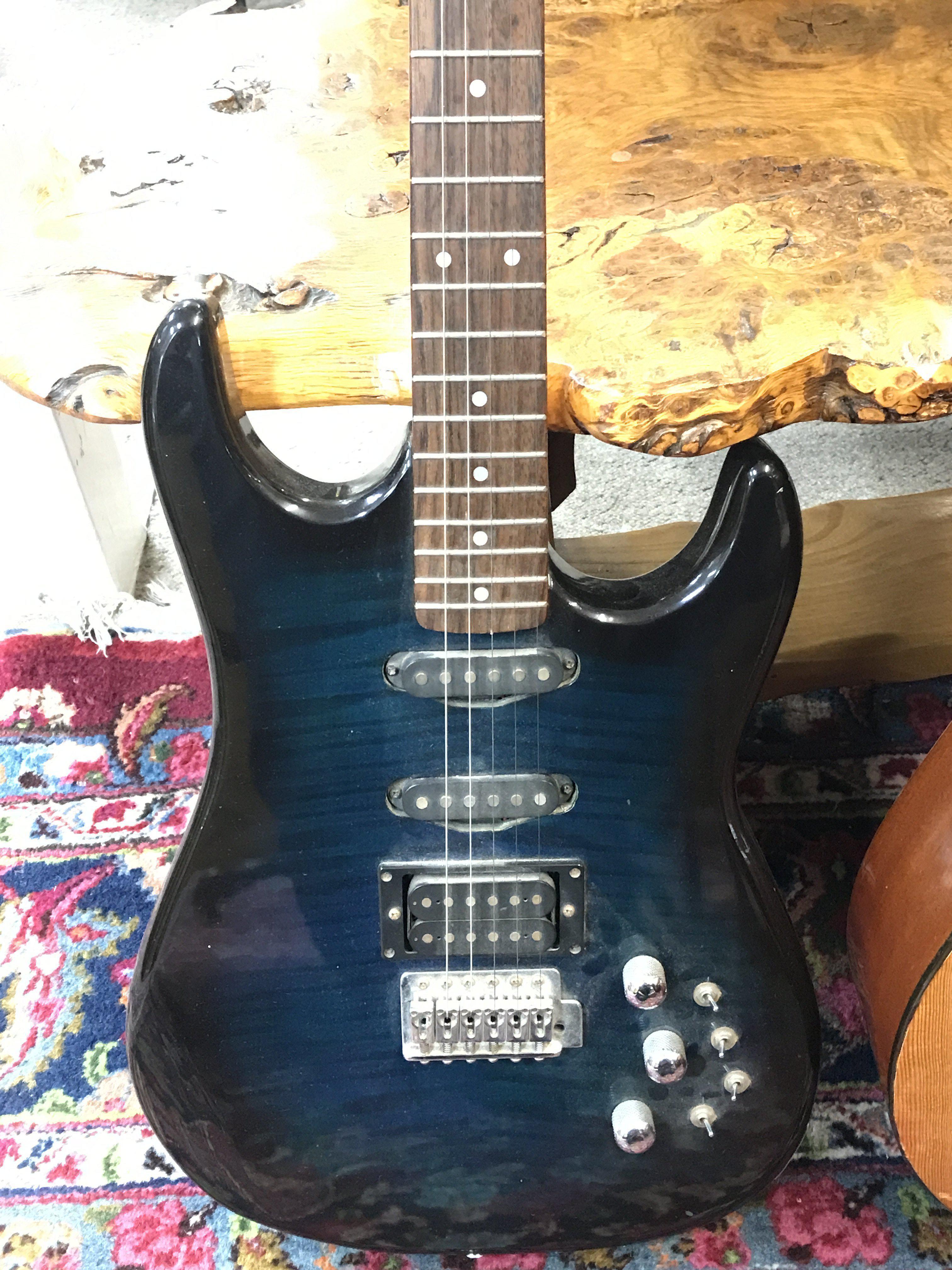 An Encore Hunter 644 series electric guitar and a Bespana classical acoustic guitar . This lot cannot be posted- NO RESERVE