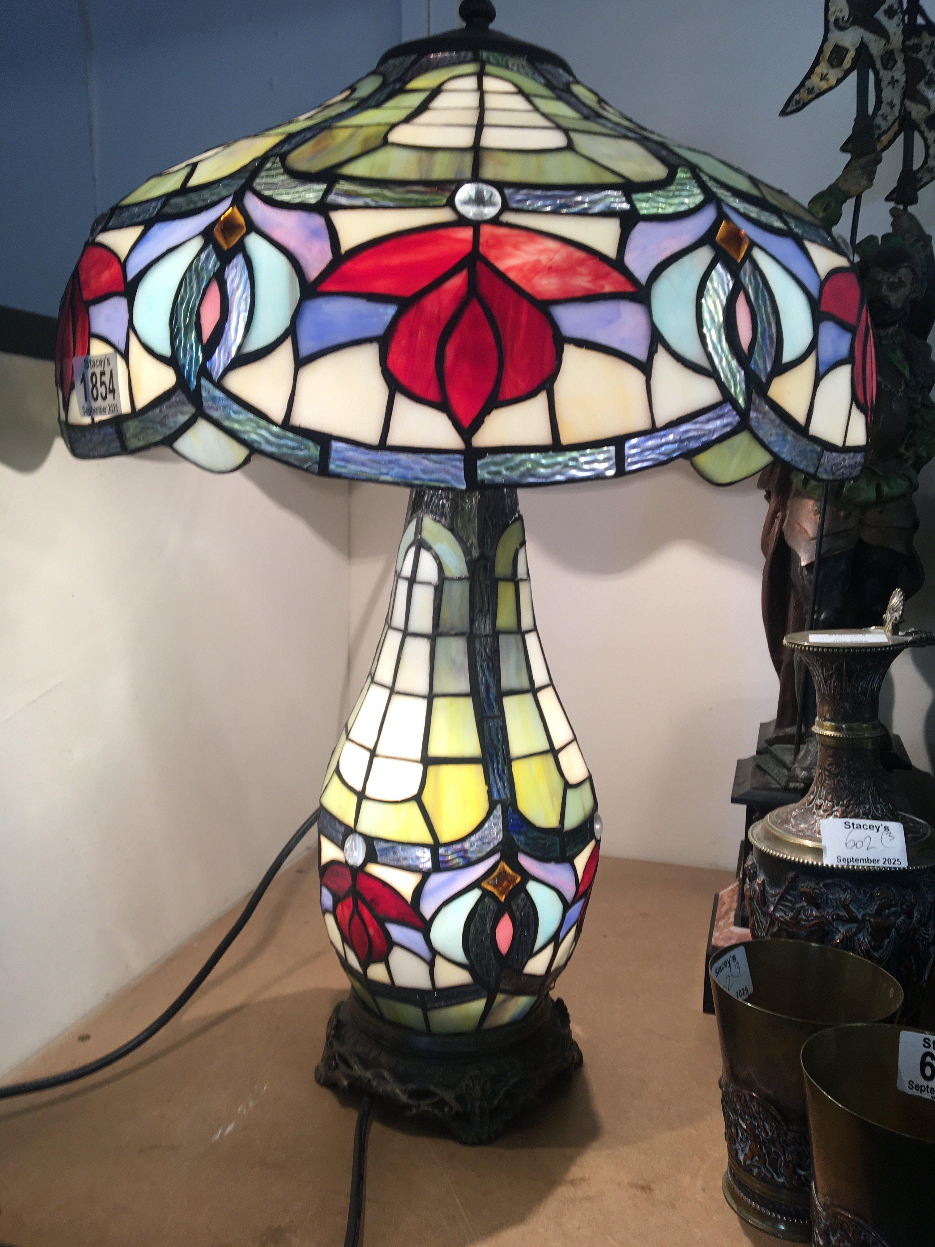 A Tiffany style lamp .
