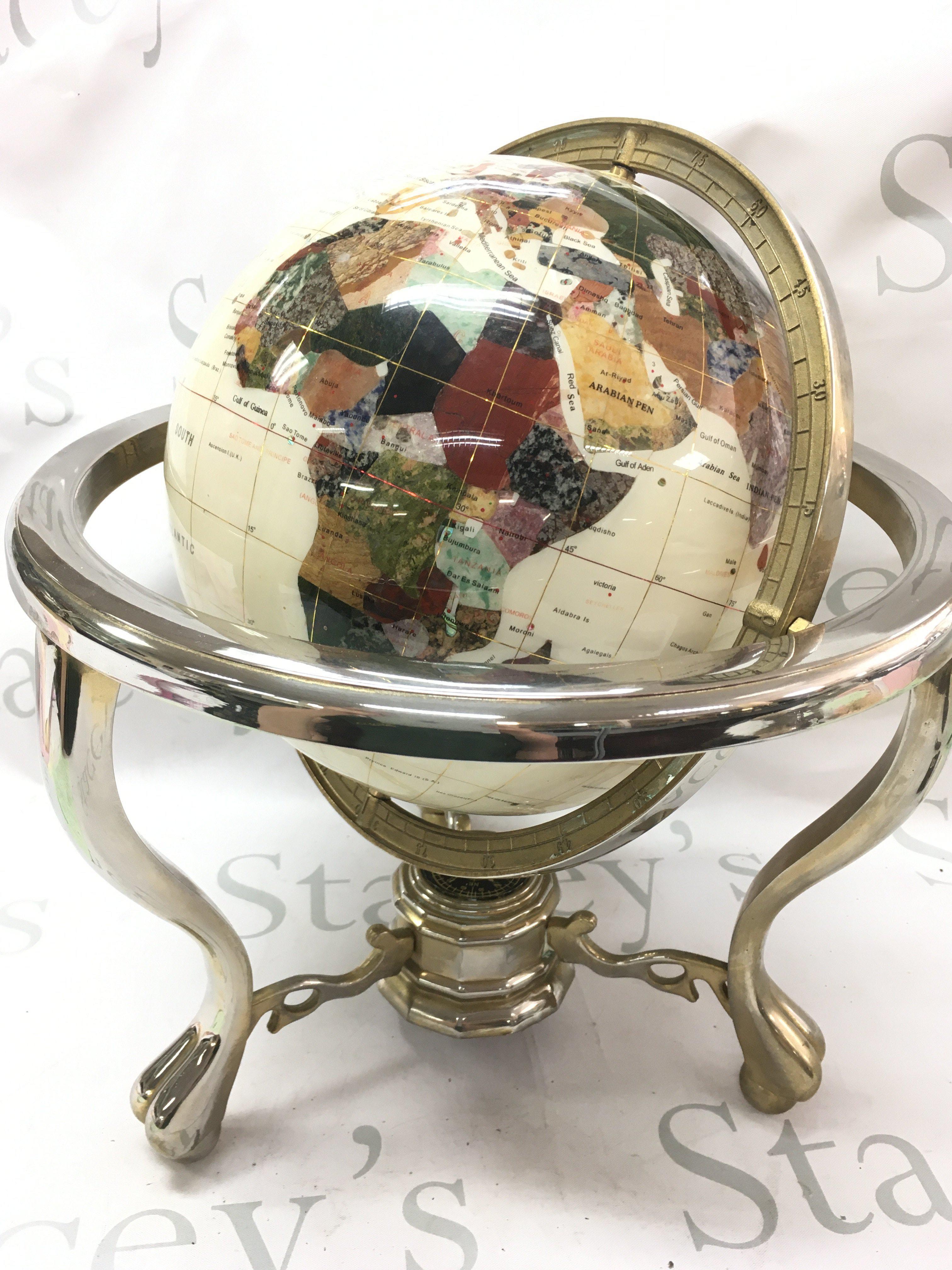 A specimen globe , 36cm tall. Postage category C