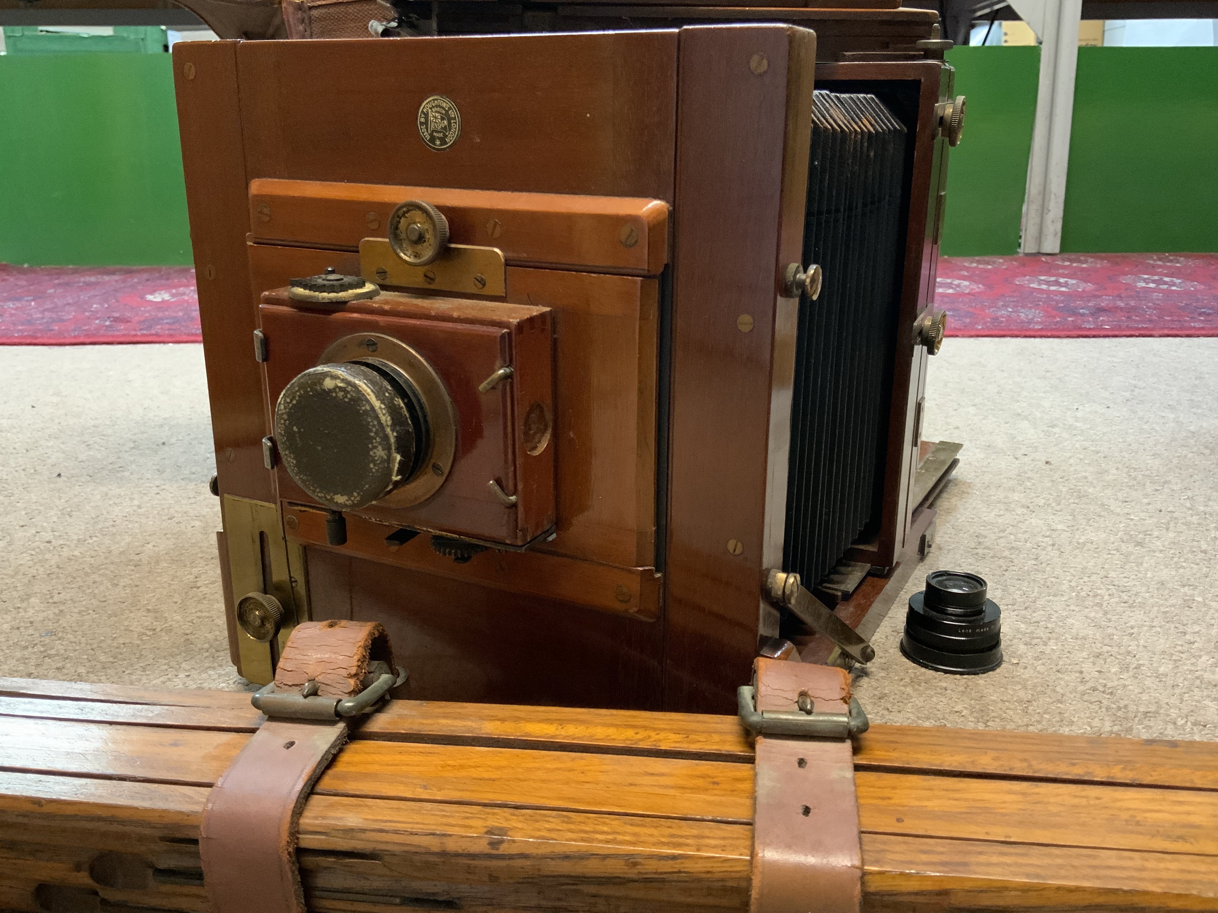 A cased Houghton Ensign plate camera, original case, Tripod Lenses, plates.