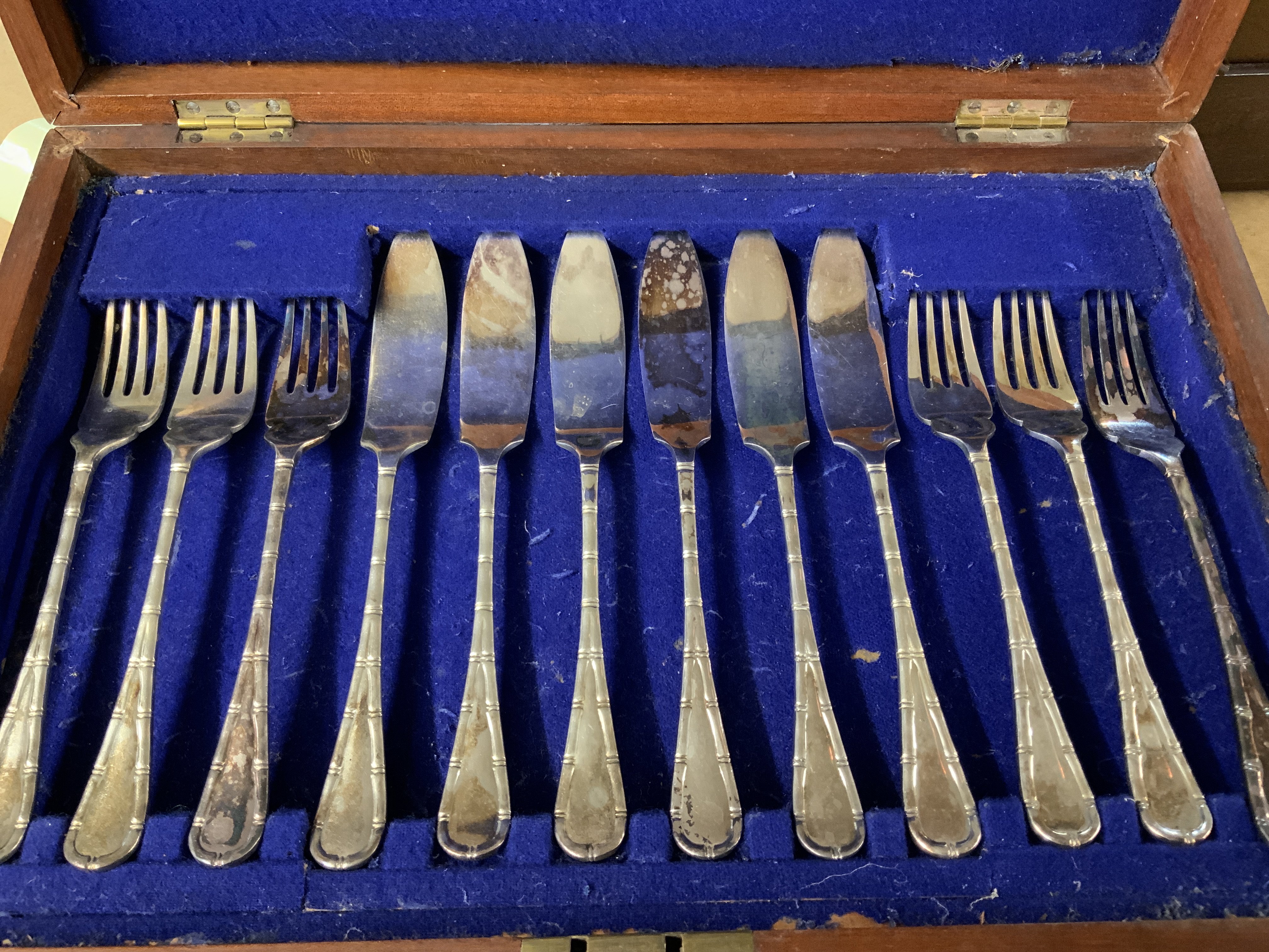 2 cased silver plated canteens of cutlery.