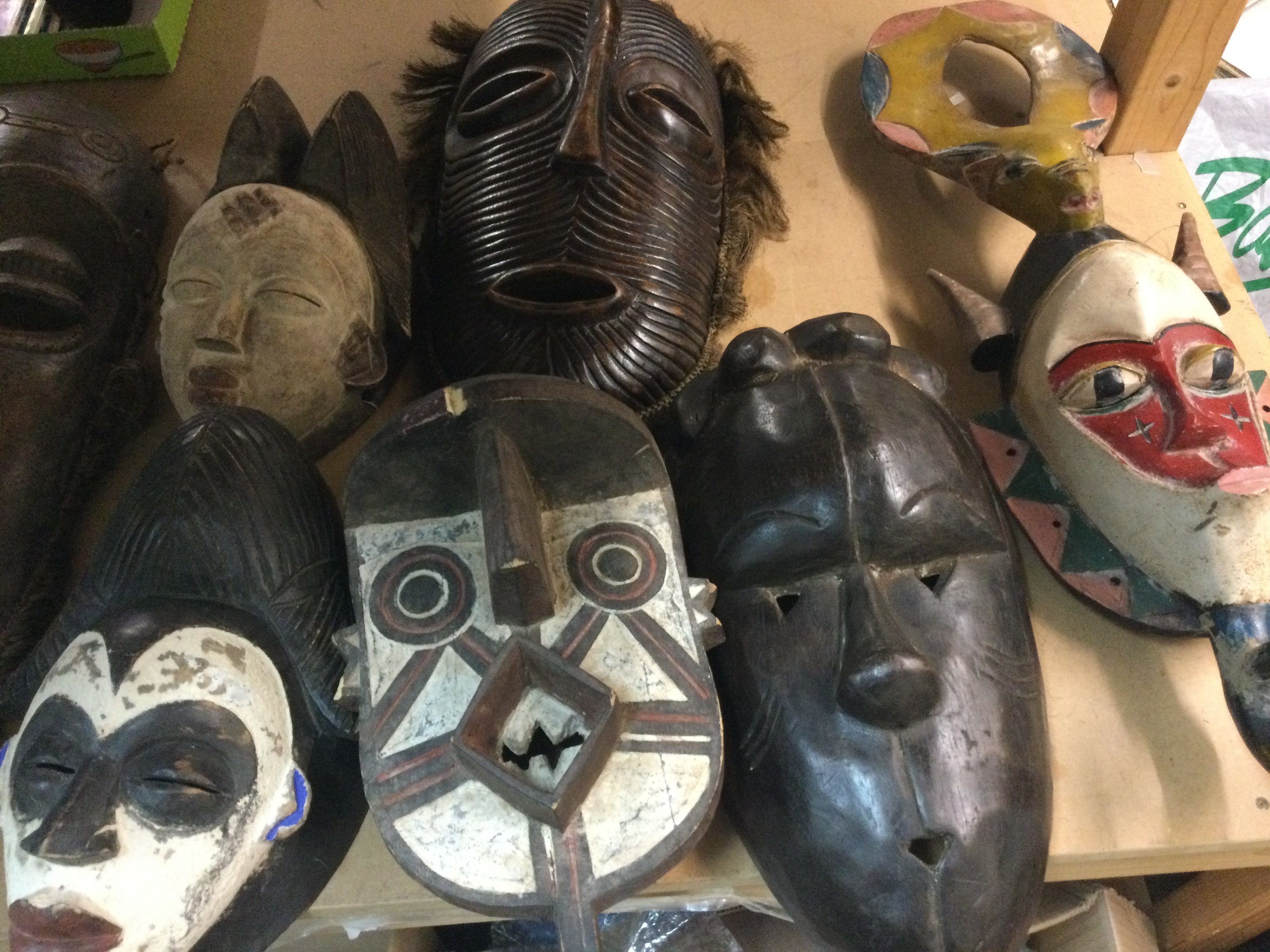 A collection of African tribal masks including Republic of Congo Bo Bo , Ivory Coast and Cameron.