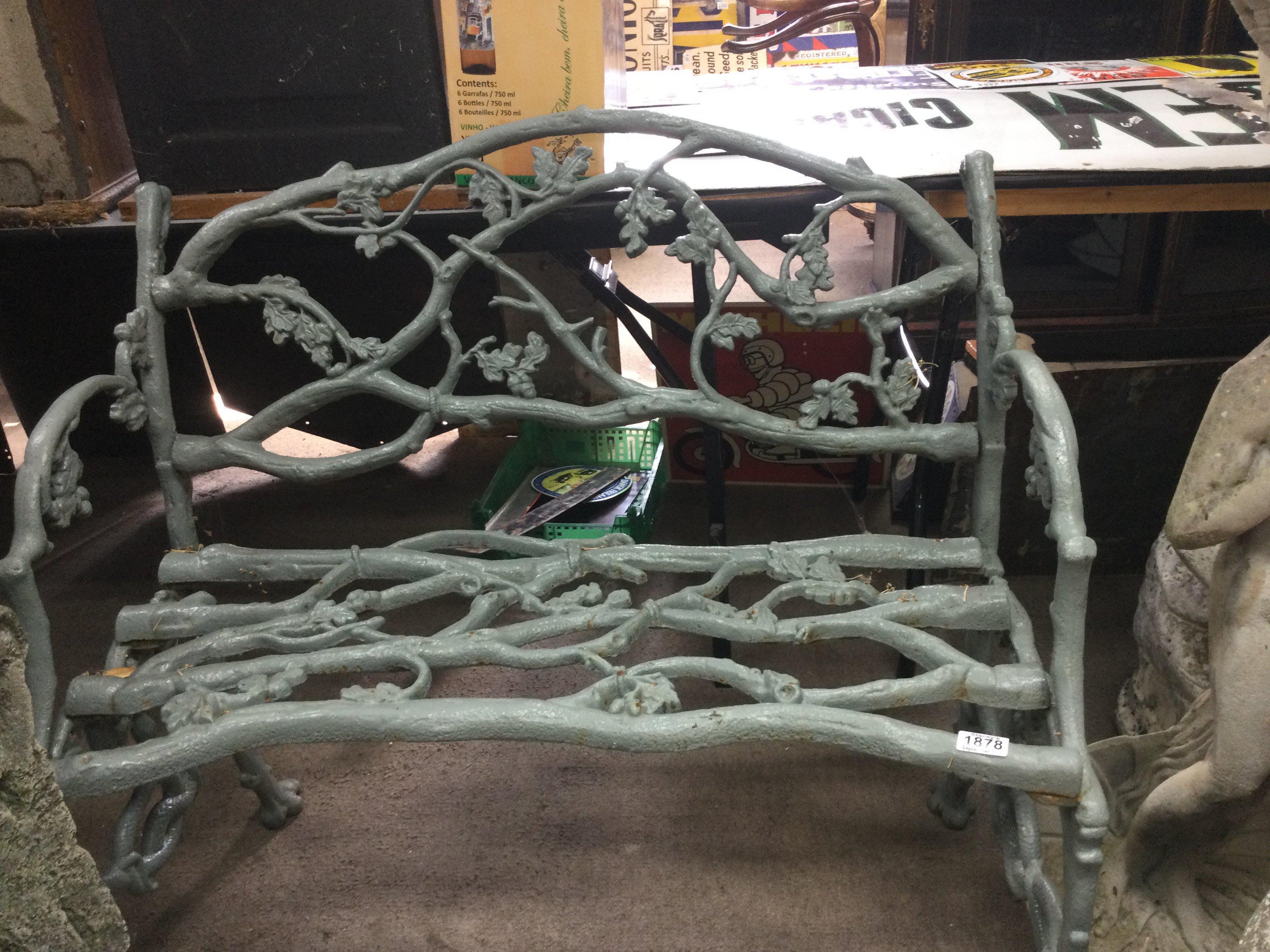 A Victorian cast iron coalbrookdale style garden bench with oak leaf design. 90 x 95 cm .