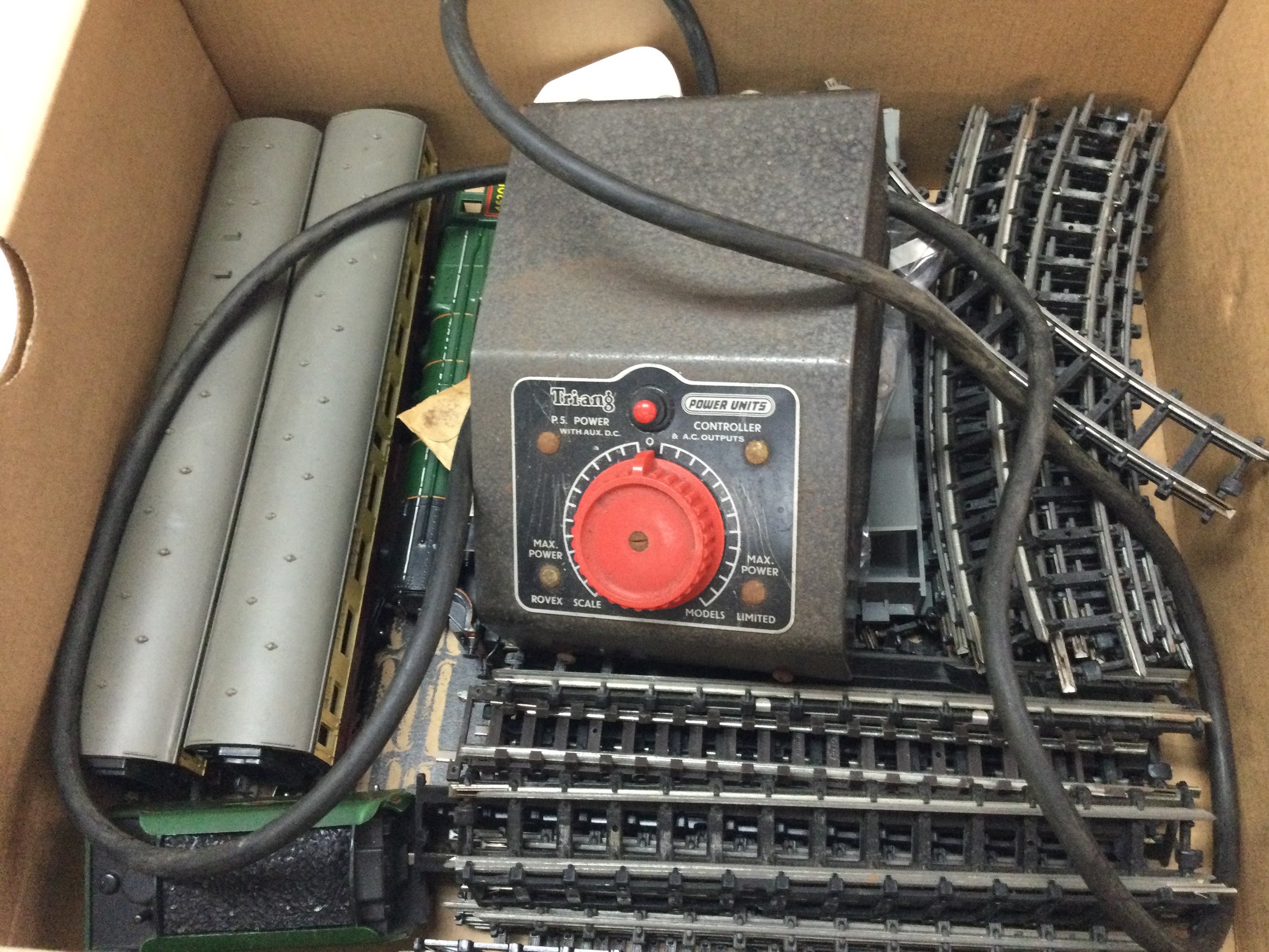 A train set including Tri-ang track pieces, P.5 power power unit . Postage category B