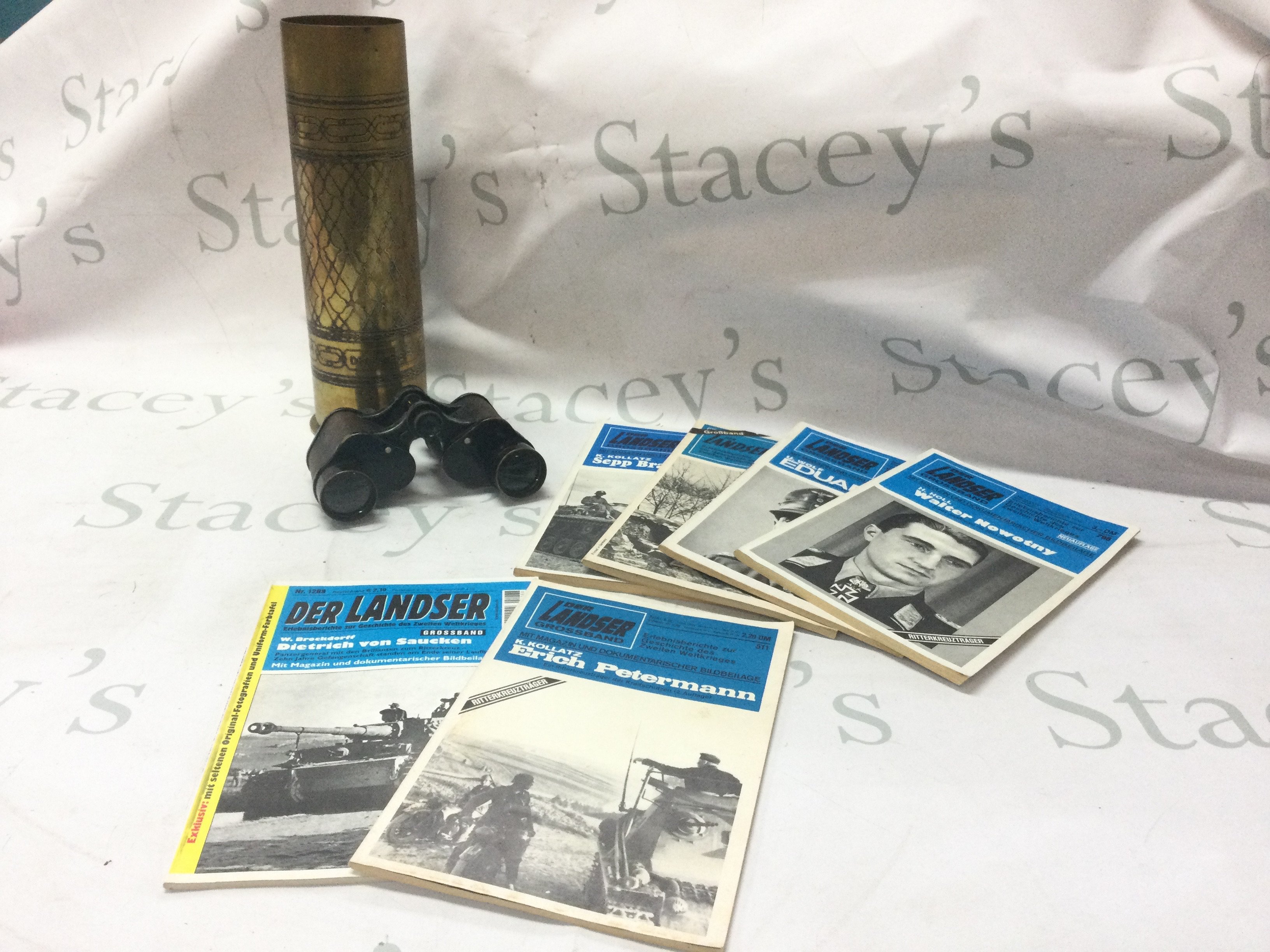 A WW1 Trench art decorated shell Jerusalem , 6 Der Landser Grossband German war magazines a pair of Bausch & Lomb USA military Stereo 6x30 binoculars . Postage category C