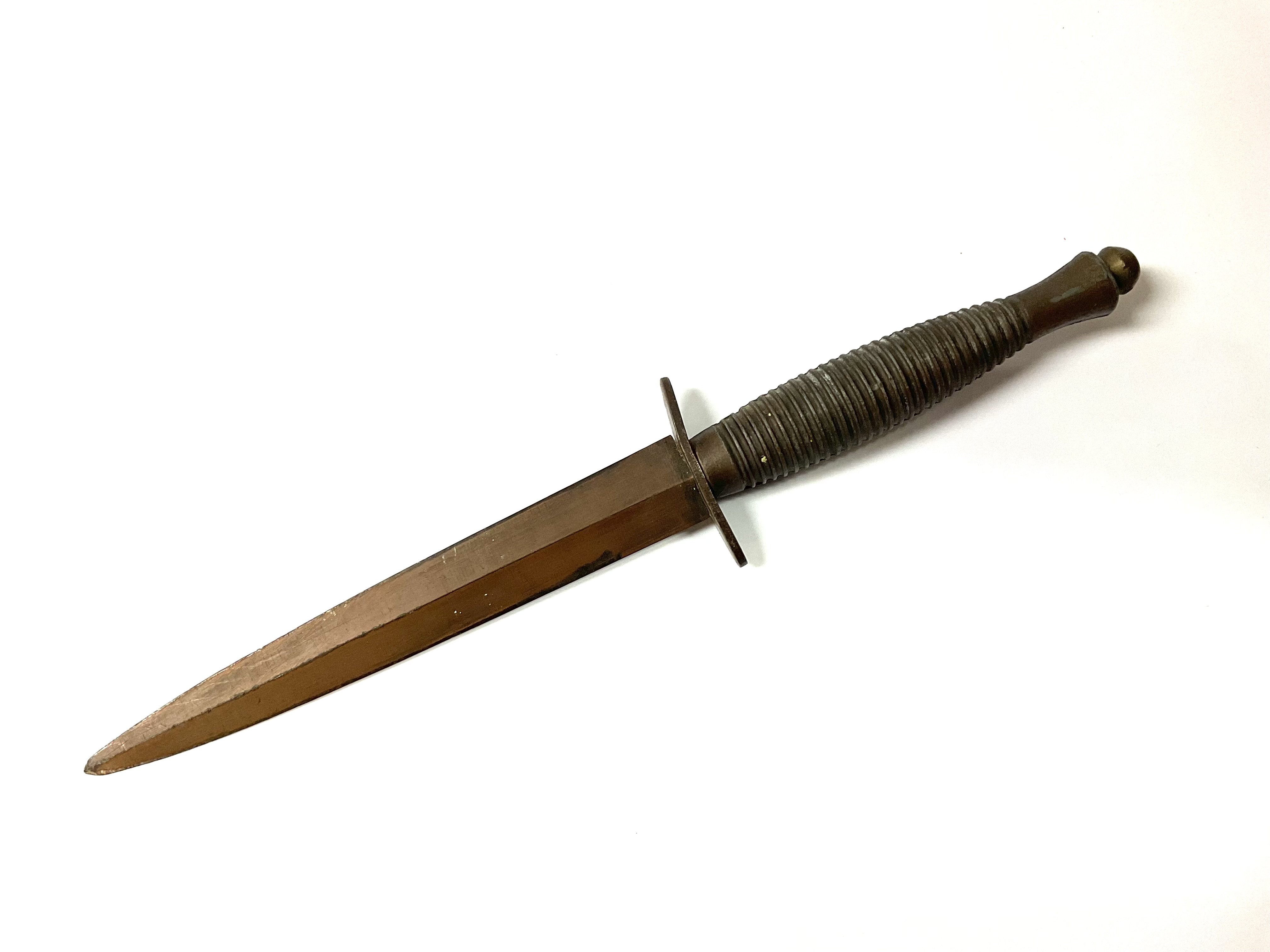 British 3rd Pattern Fairbairn - Sykes Fighting Knife. 175mm long double edged blade. Overall length 295mm. Crossed keys & *D mark to grip