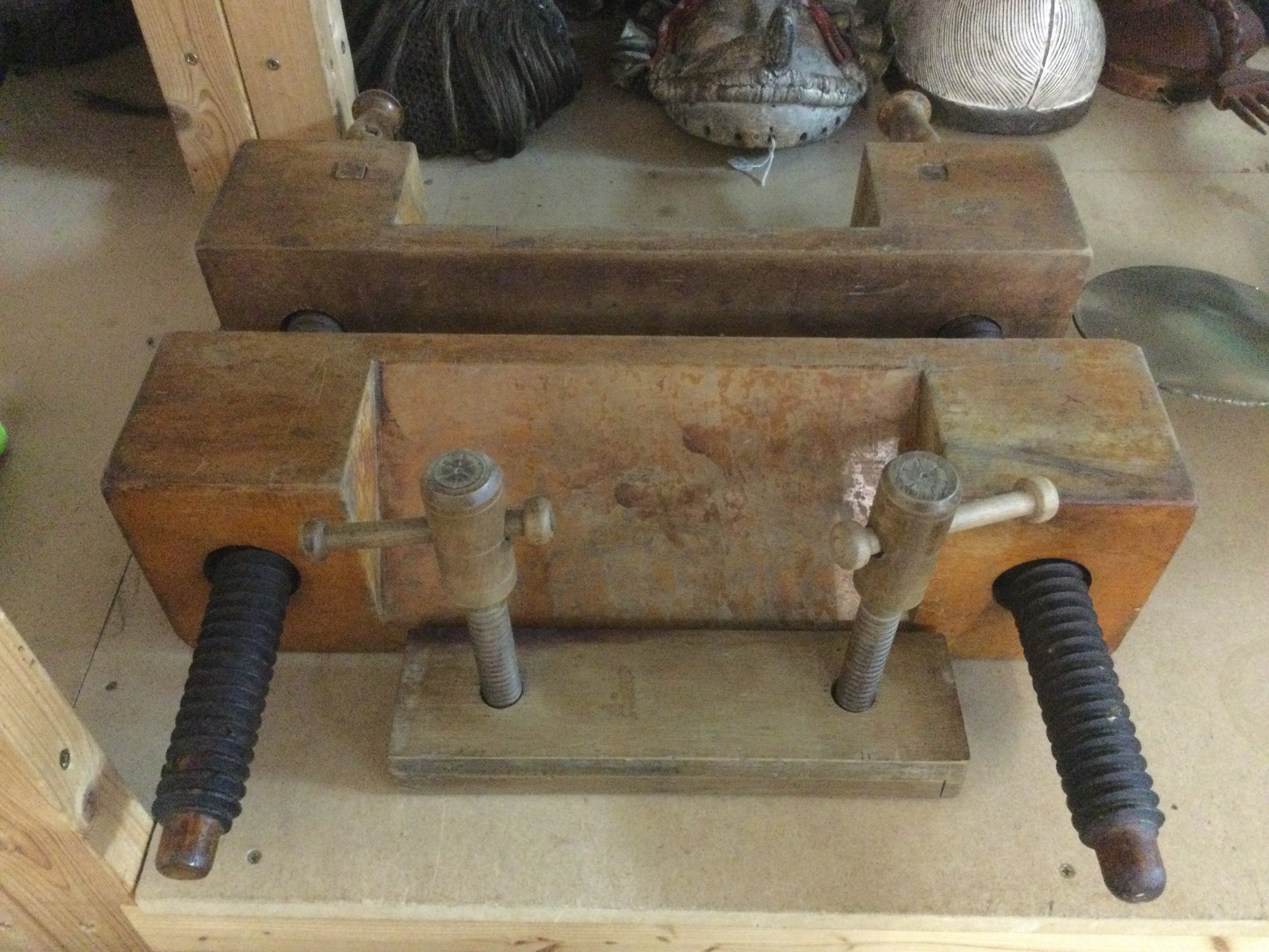 A large book press and a smaller example (2). Shipping category D.