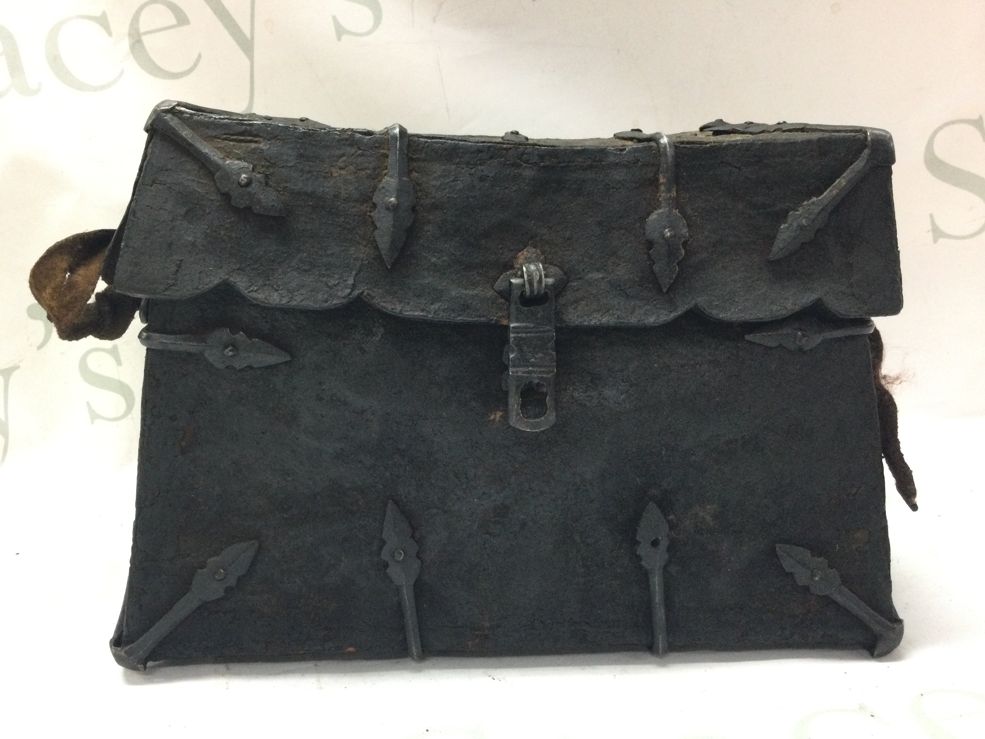 A Tibetan Yak Skin and iron bound saddle box . 17cm tall 25cm wide 13cm long approximately. Postage category C