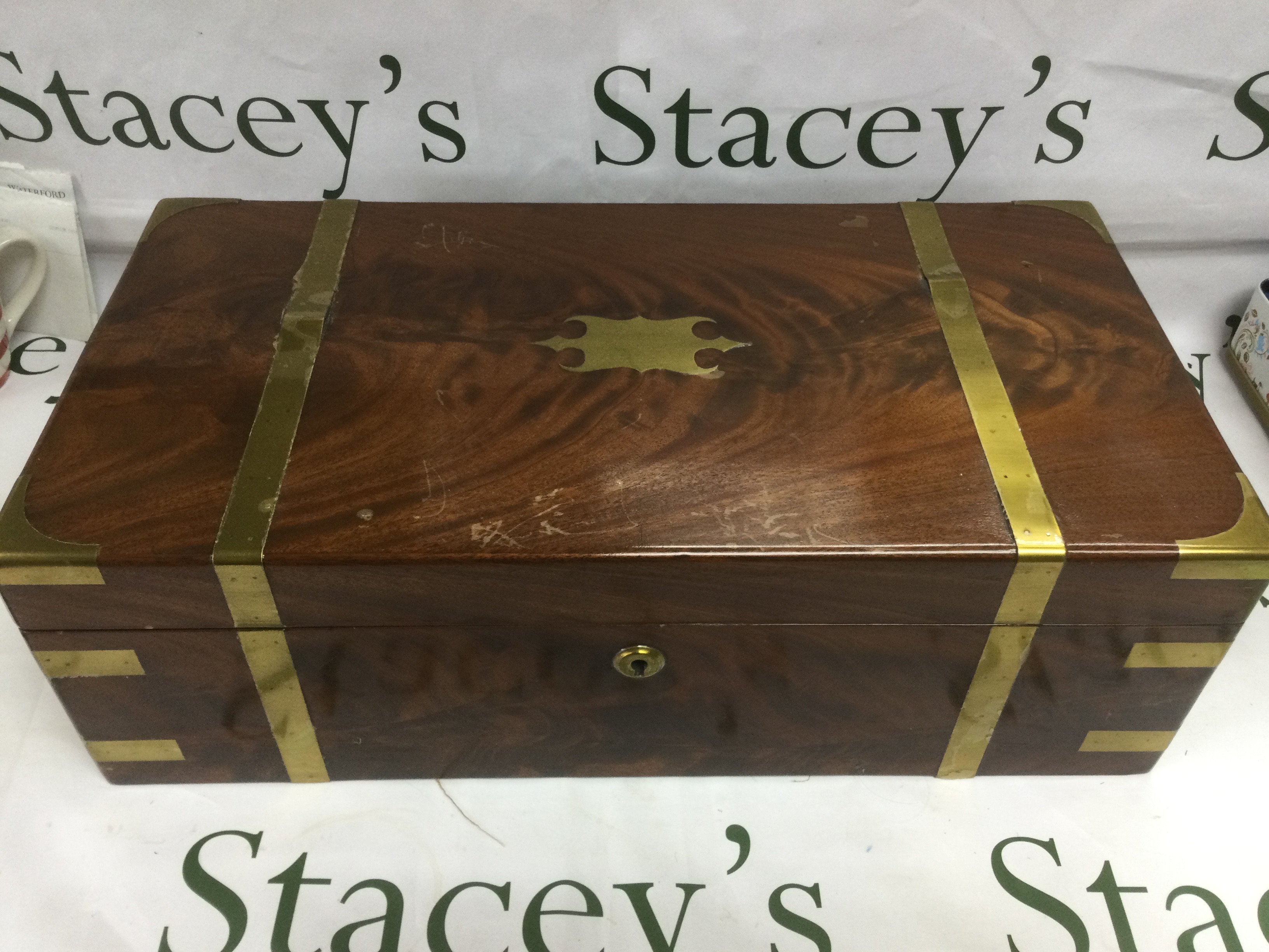 A brass bound walnut writing slope, approx 50.5cm x 26cm x 16.5cm. Shipping category D.