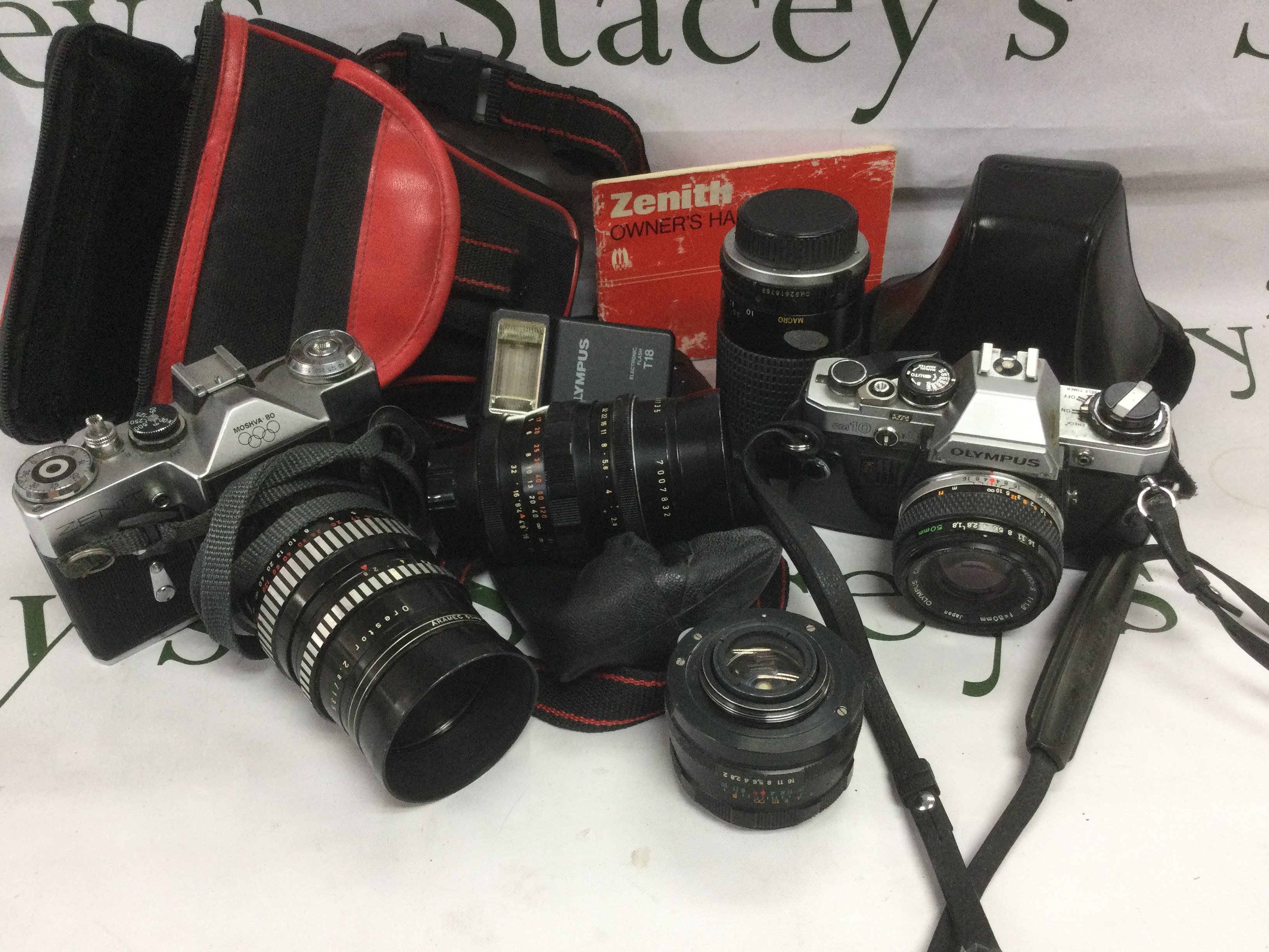 WITHDRAWN - A collection of SLR cameras and lenses. Shipping category D.