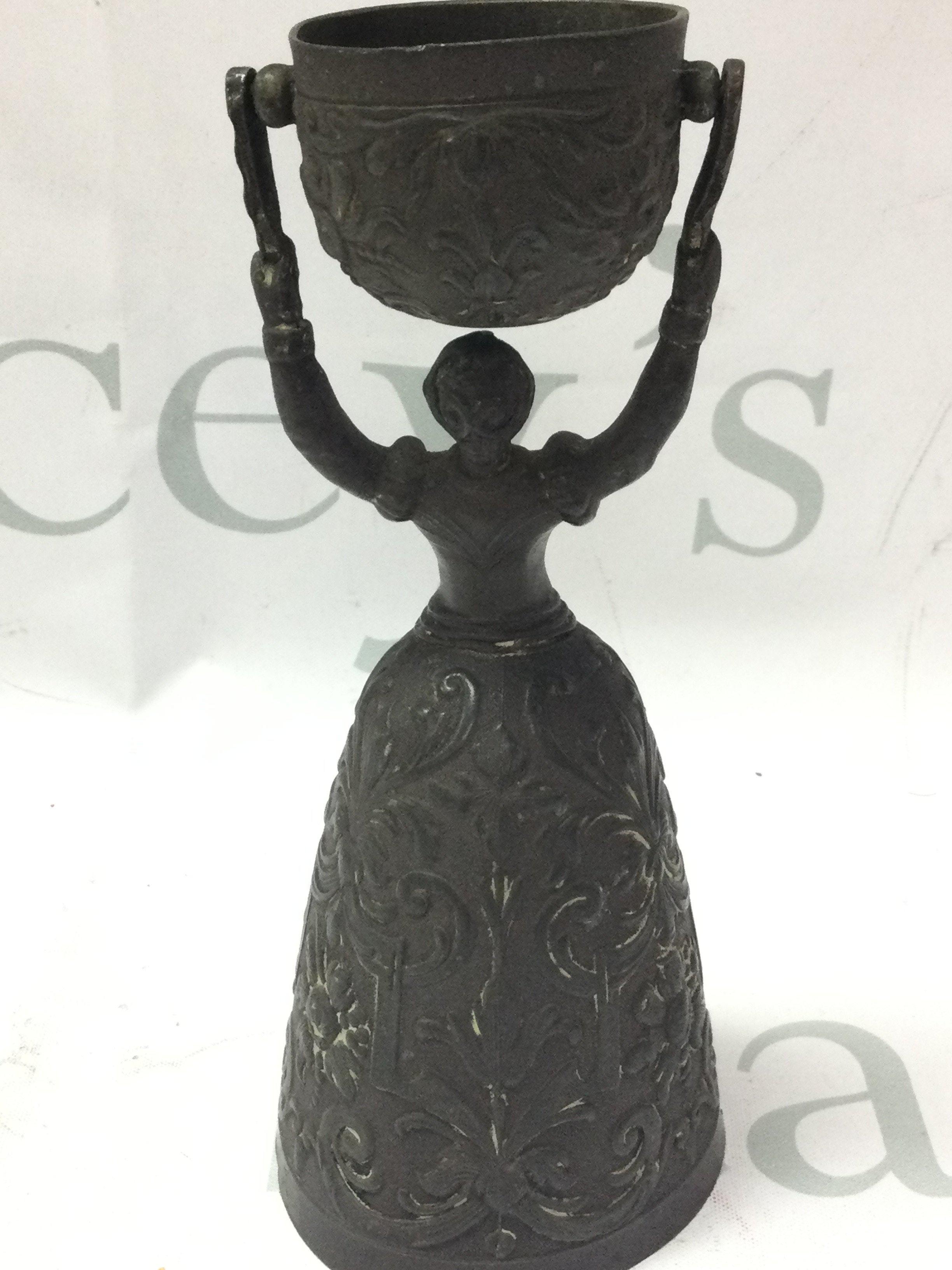 A bronzed wager cup, 16.5cm tall. Postage category B