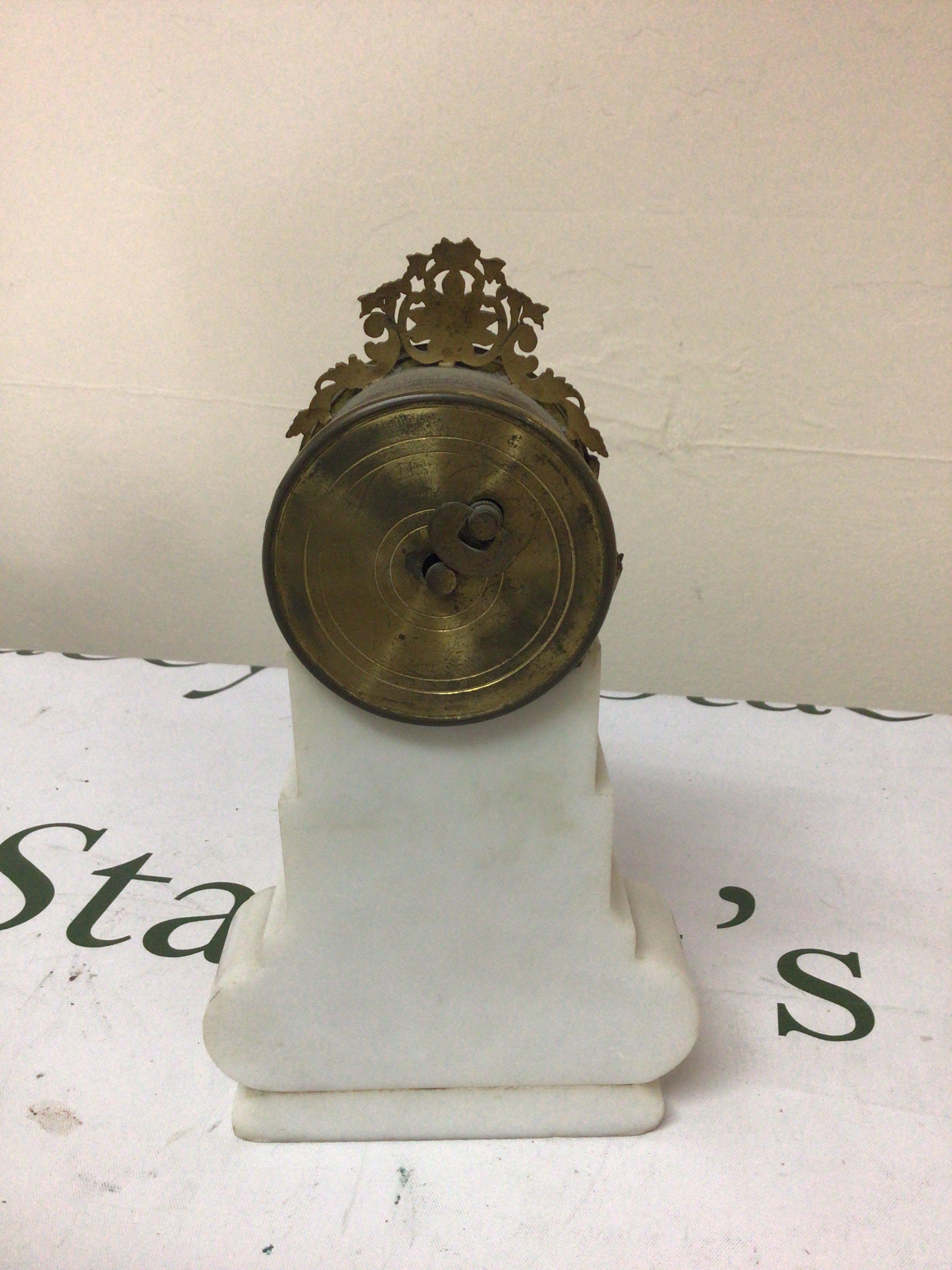 A French white marble clock with gilt metal punts for restoration. Hight 22cm- NO RESERVE