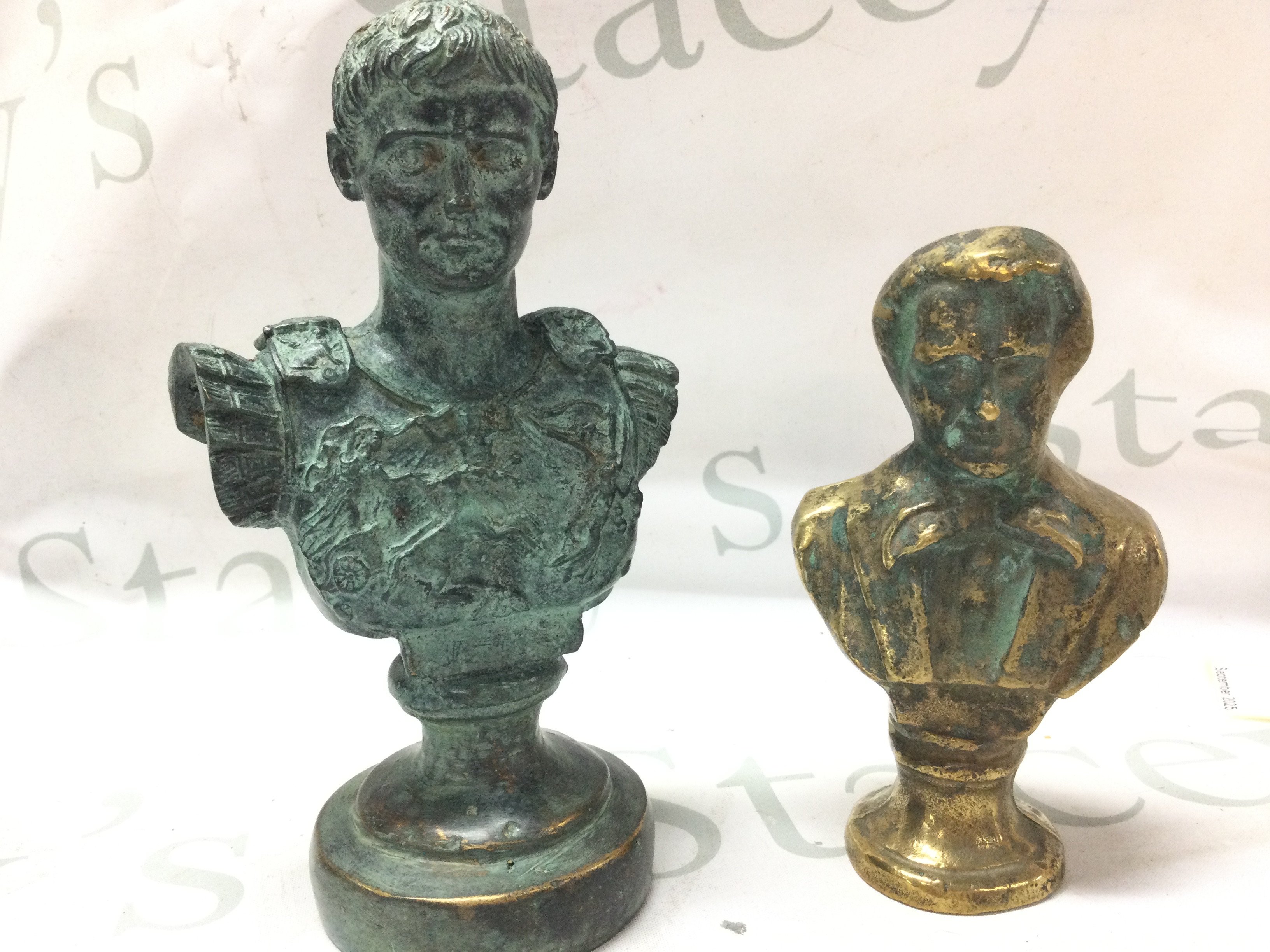 Two bronze busts. Postage category B