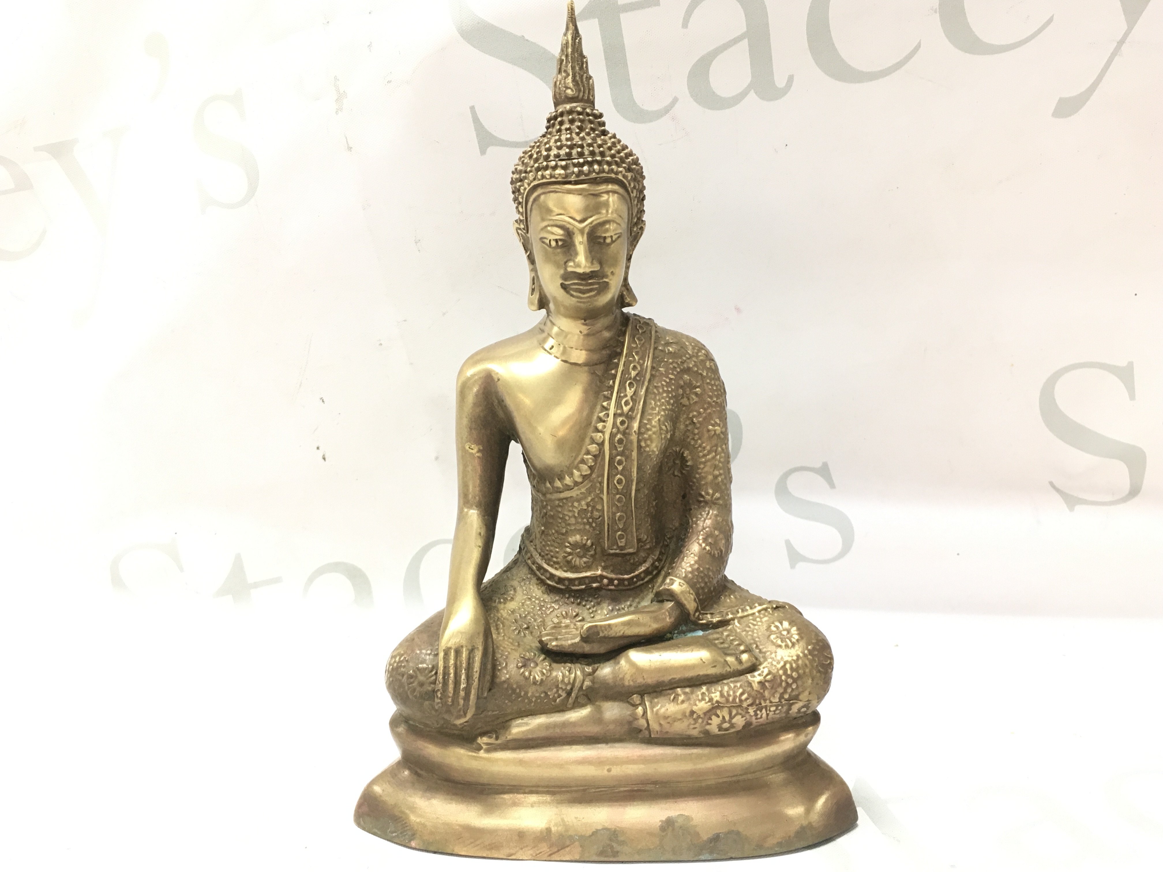 A bronze Buddha figure , 21cm tall. postage cat b