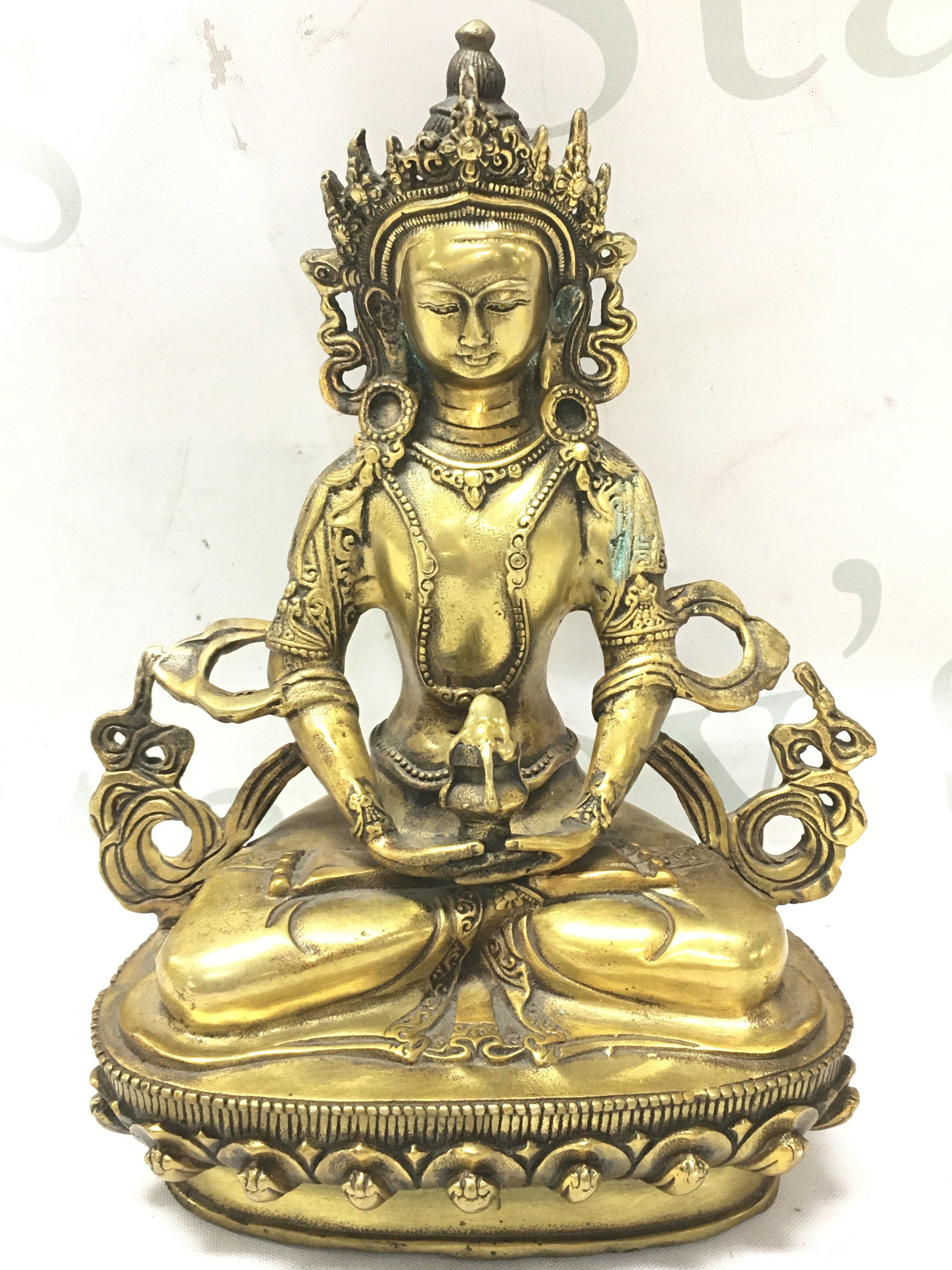A bronze Buddha figure , 19.5cm tall. Postage cat B