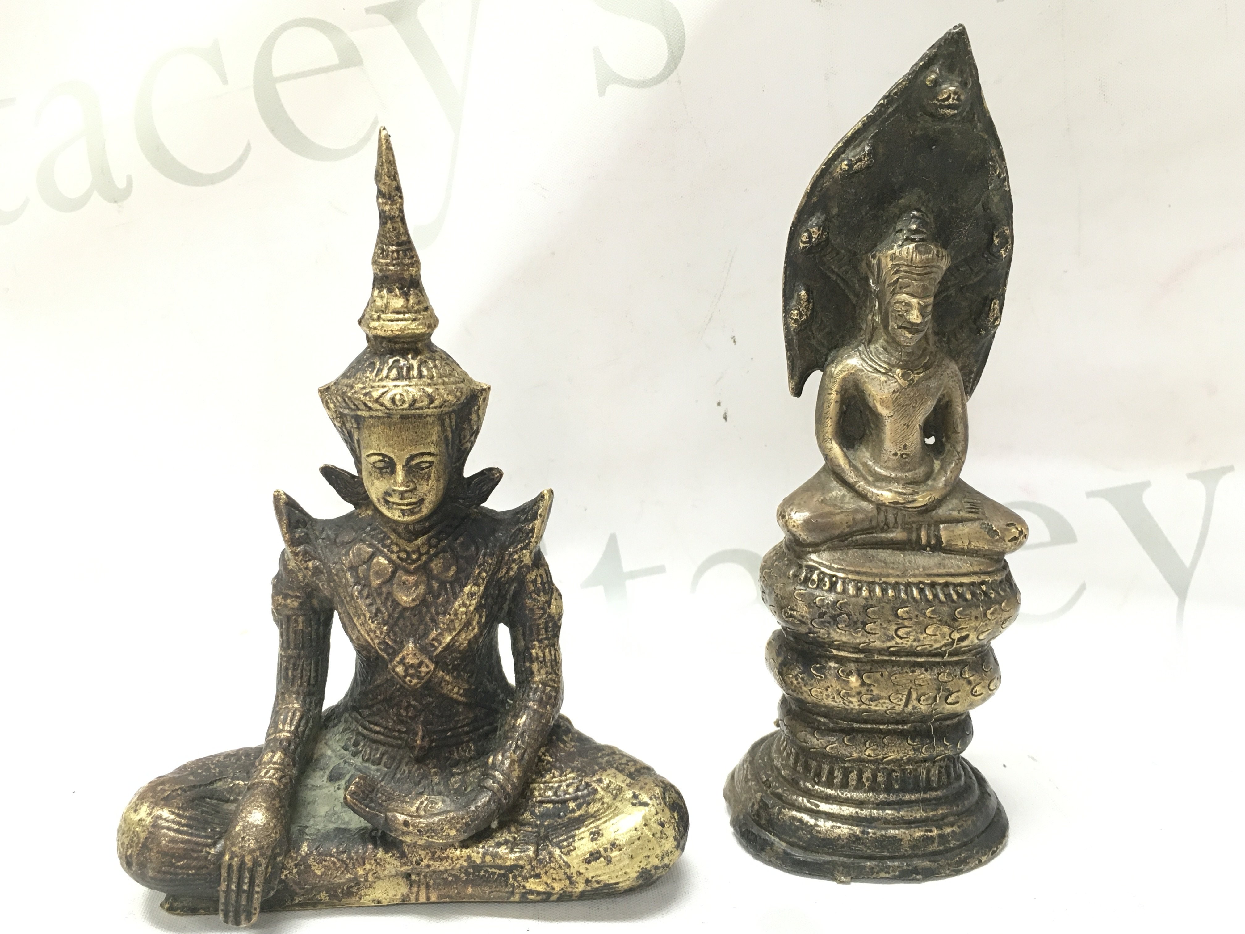 Two Khmer Bronze Buddhas including a 19th century Sino Tibetan cast bronze Sakyamuni Buddha , 15 and 16.5cm tall. Postage cat b