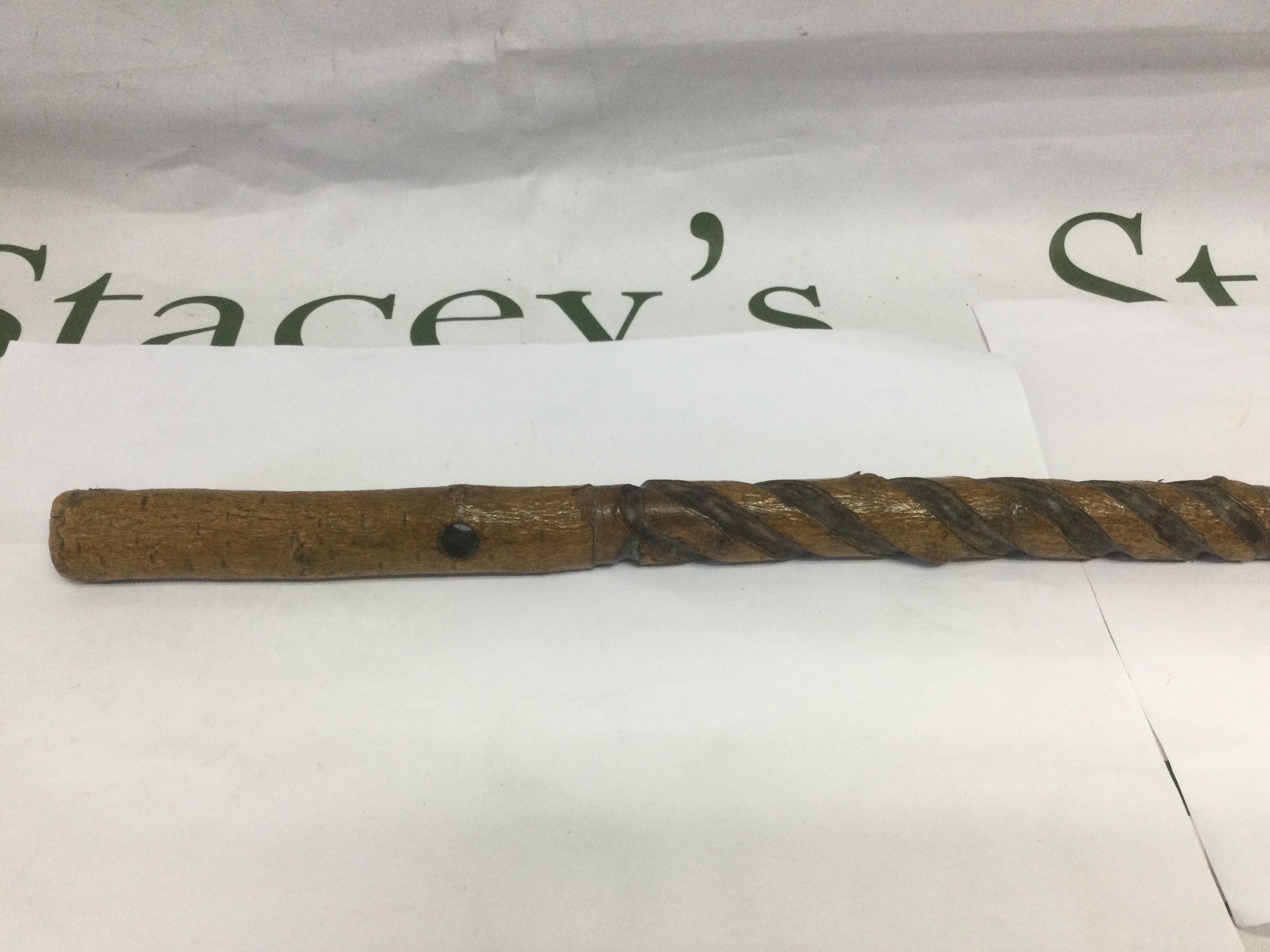 A walking cane of part barley twist form, approx total length 90cm. Shipping category D.