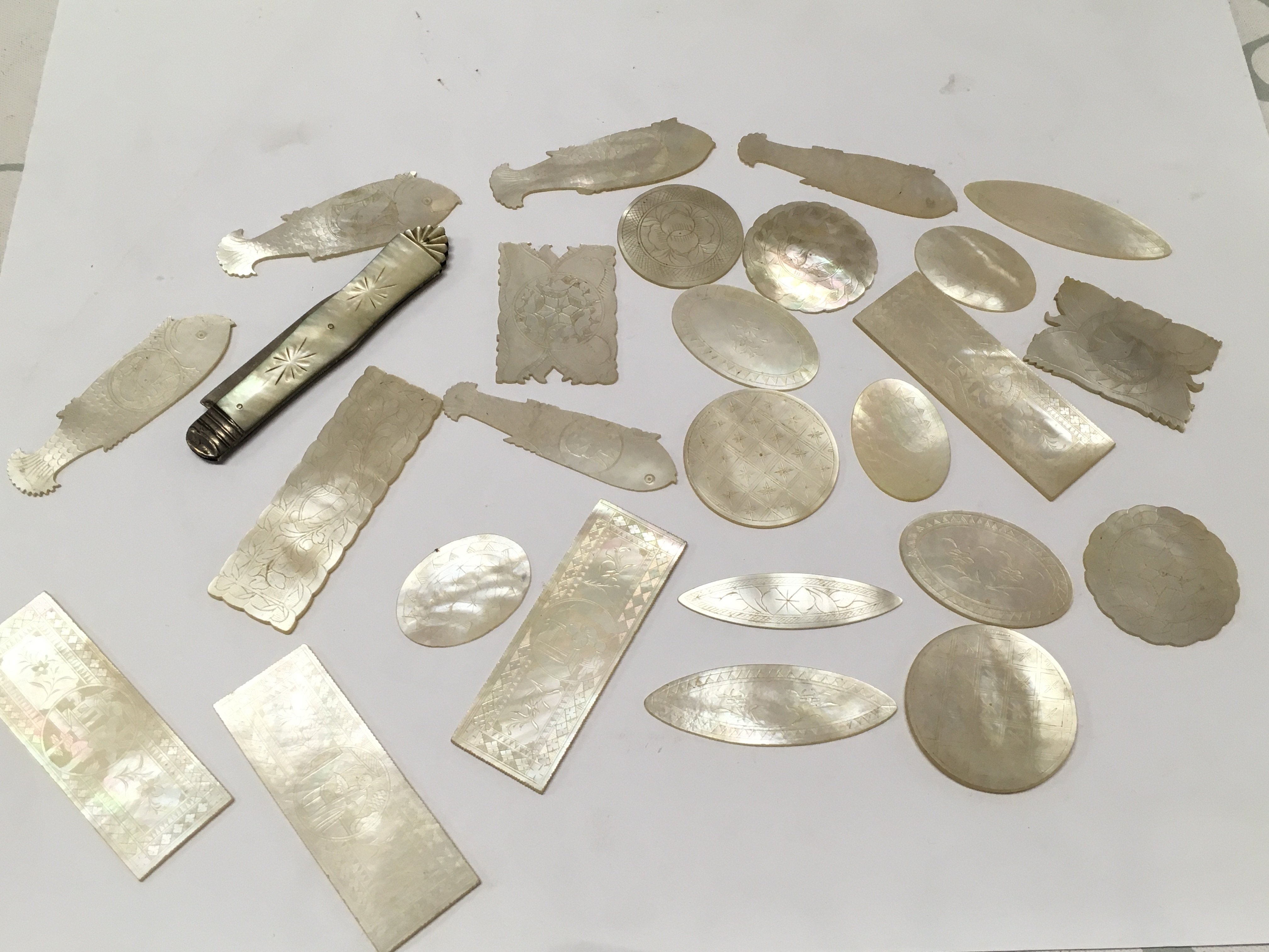 Chinese 19th century mother of pearl gaming counters and folding mother of pearl Penn knife with hallmarked silver blade for Sheffield 1878