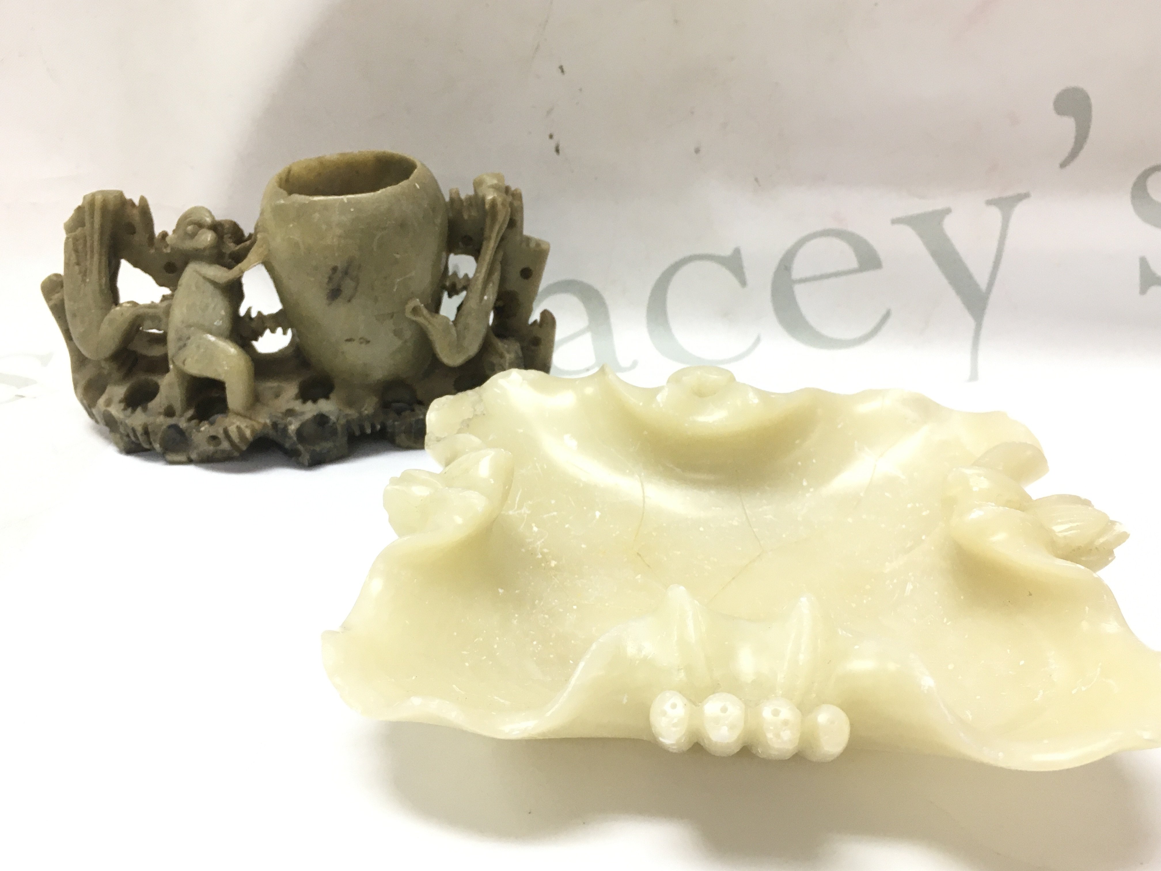 Chinese carved soap stone including a lotus tray (14cm wide) and a carved monkey with vase brush pot( 7cm tall) and red cinnabar lacquered box (7cm tall 15cm wide) .This lot cannot be posted