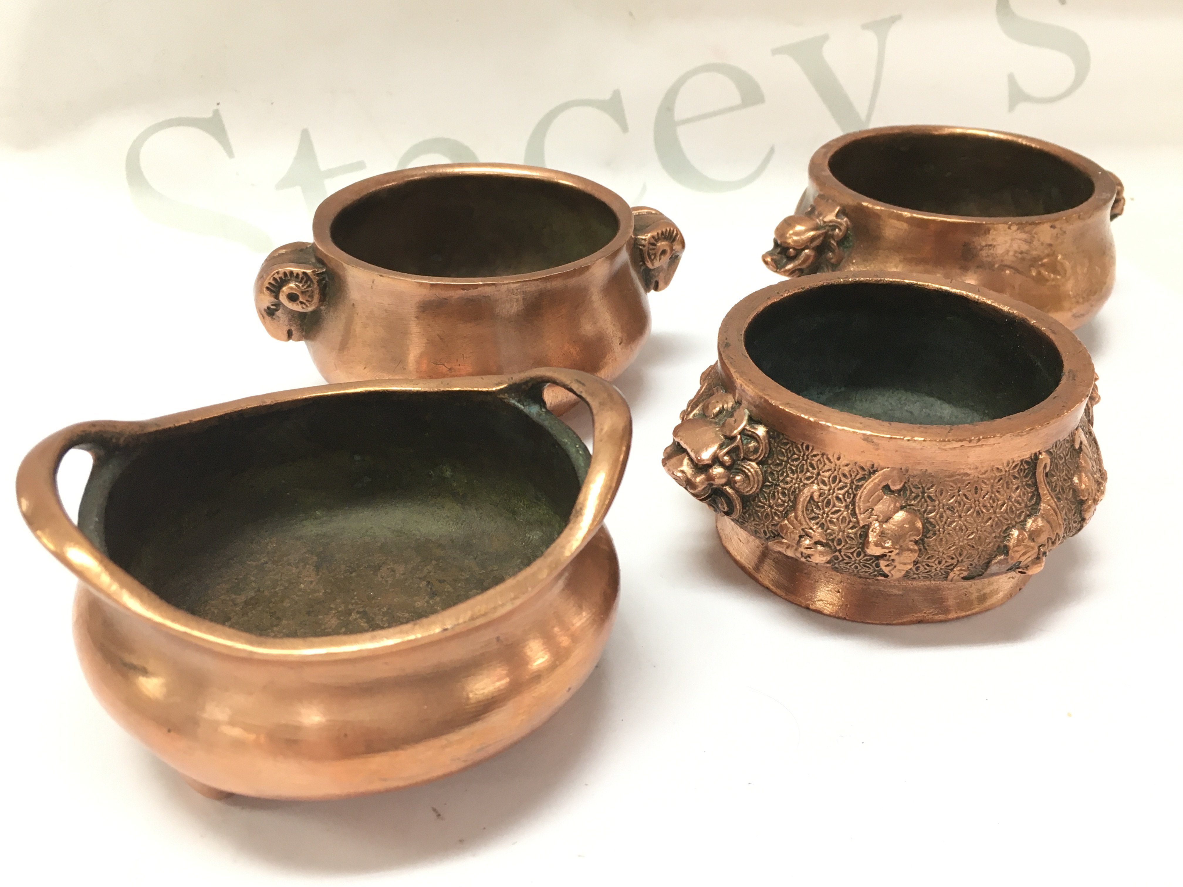 Four Chinese bronze censers with four and six character marks to bases. Postage cat B