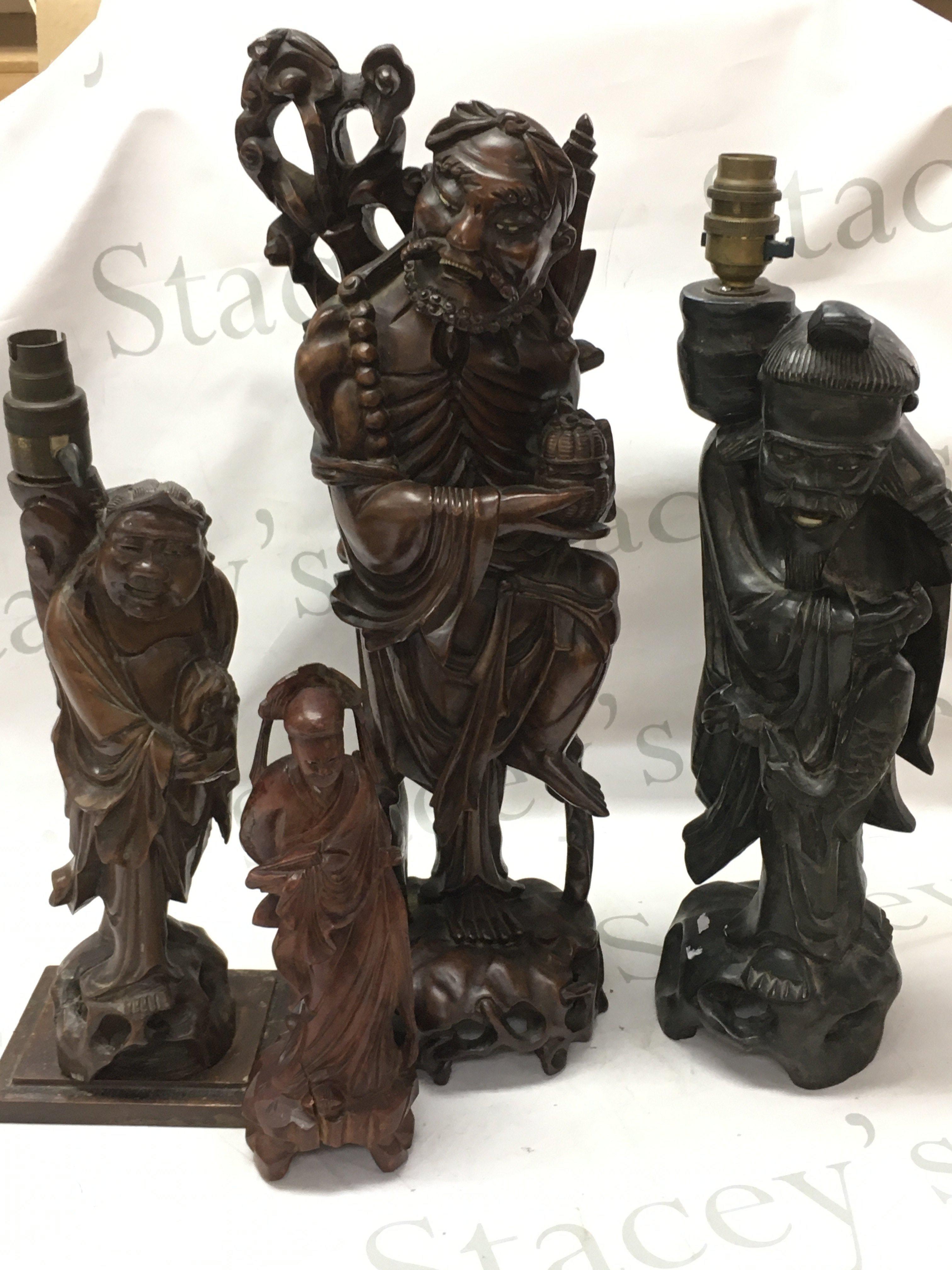 Chinese hardwood sage figures heights ranging from 25 to 49cm tall.