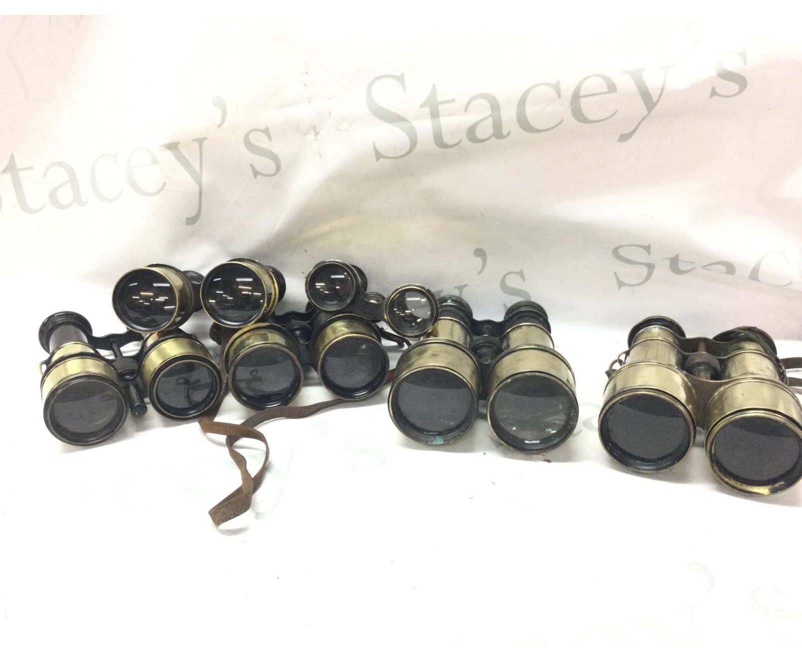 Six vintage brass binoculars , postage category C