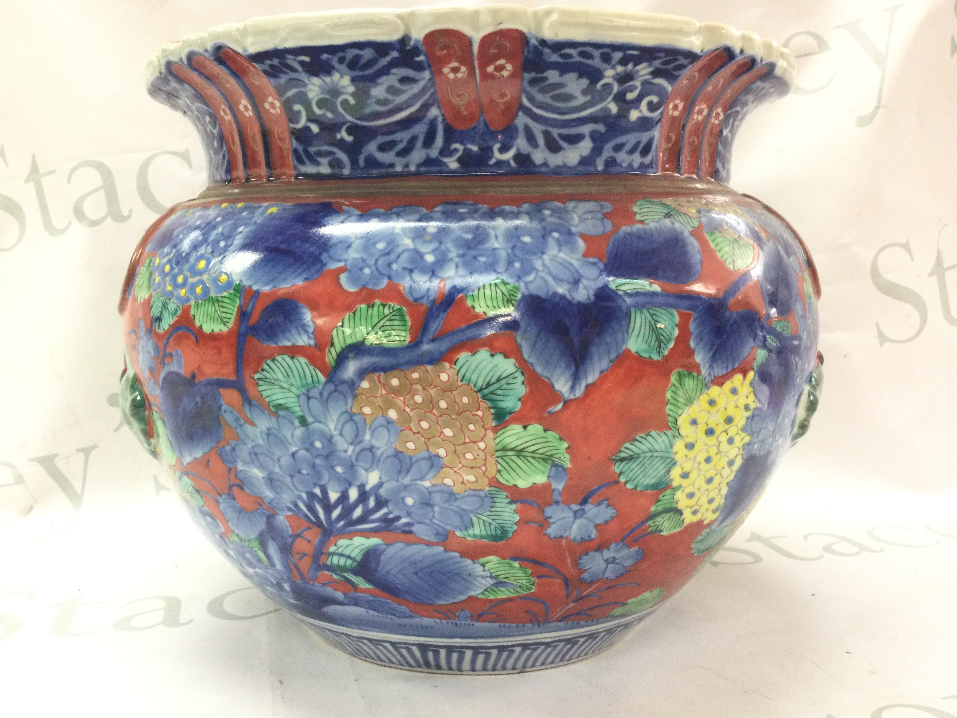 A floral jardiniere 23cm tall (hairline cracks, damage and restoration) and figures . This lot cannot be posted