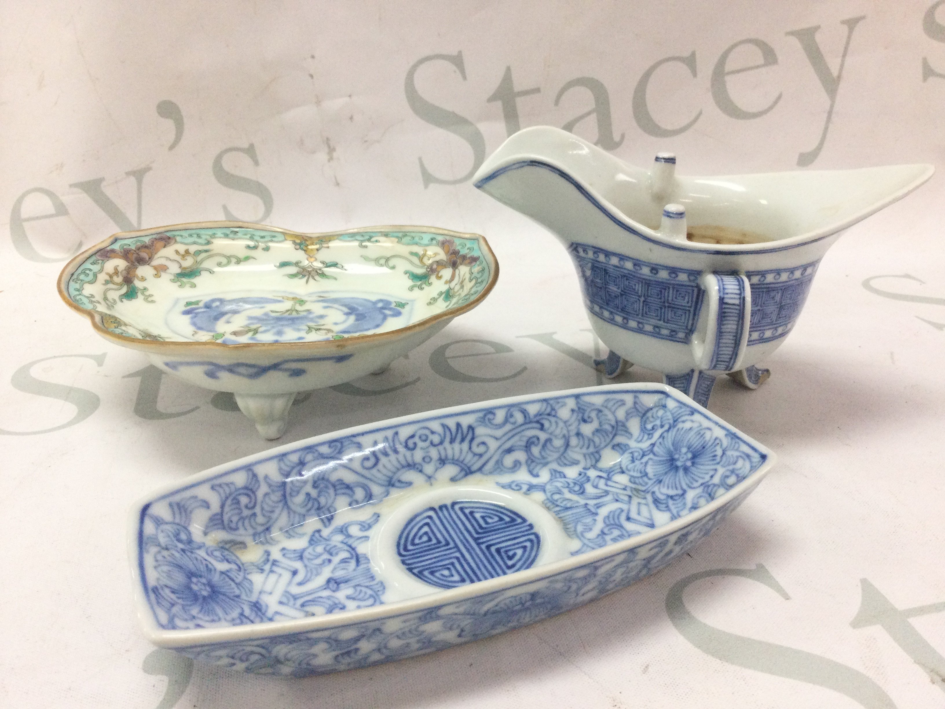 A collection of Chinese blue and white porcelain including Two small dishes and one other . This lot cannot be posted