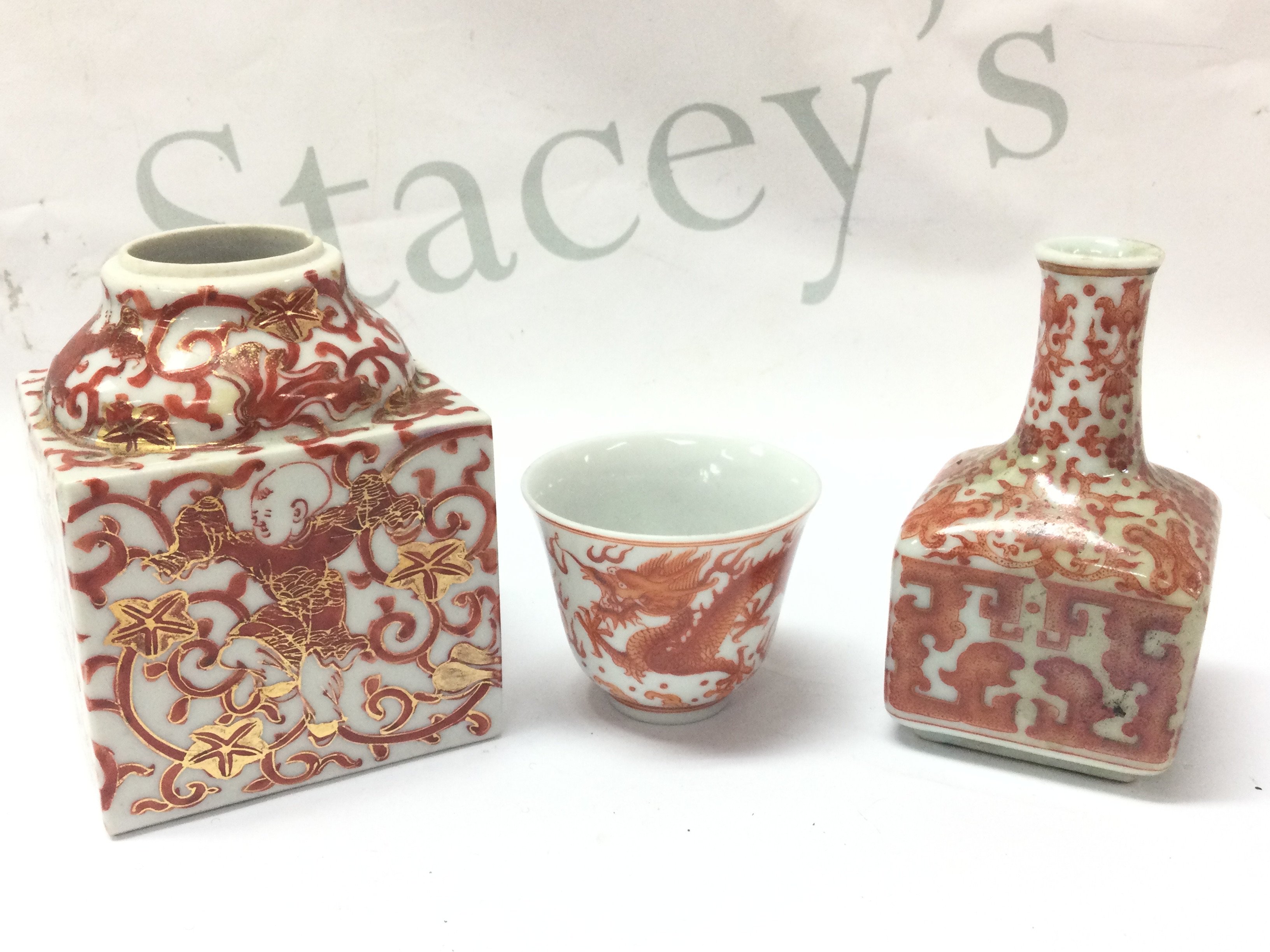 Chinese iron red porcelain vases , 5 & 10cm tall. (Chip on rim of square shaped vase) this lot cannot be posted