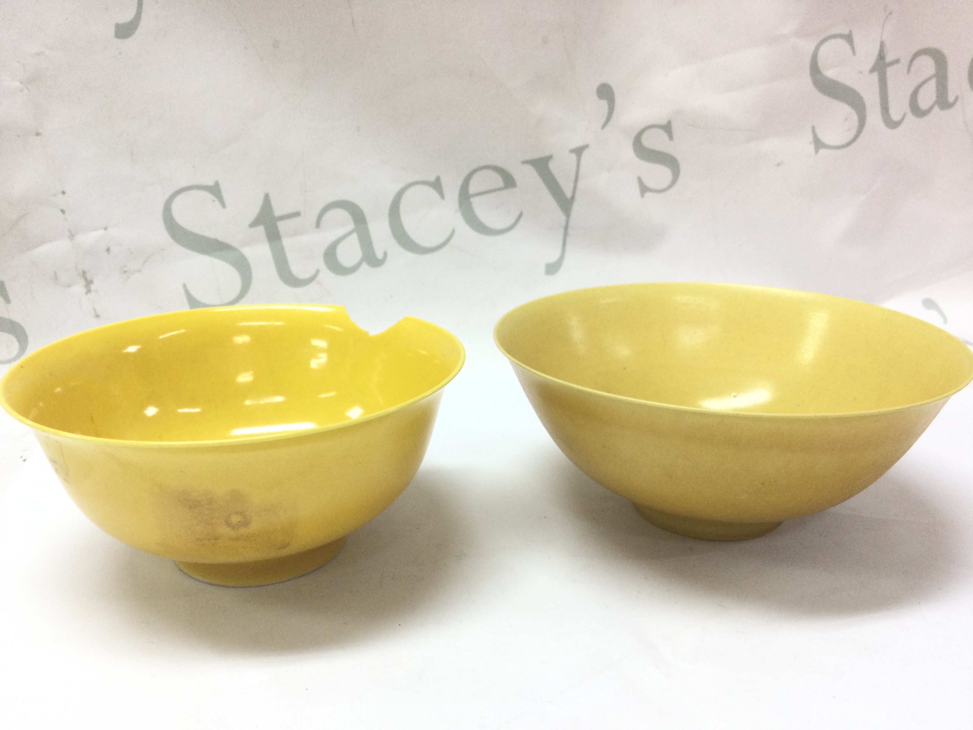 Chinese Yellow glaze porcelain bowls , one damaged . Both 6.5Cm tall ,15.5Cm wide ,13.5Cm wide . This lot cannot be posted
