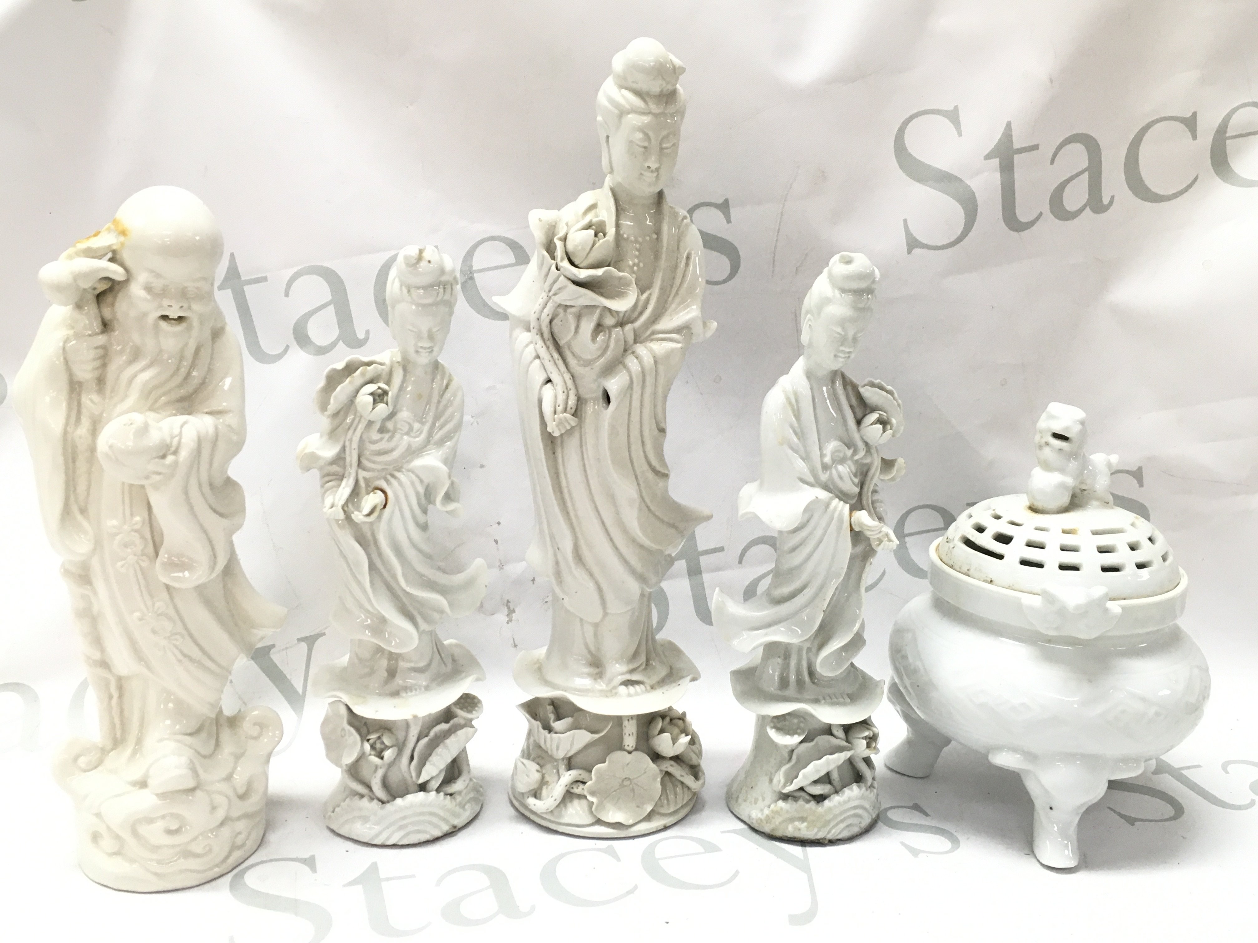 Chinese Blanc De Chi figures and a fu dog incense burner . This lot cannot be posted