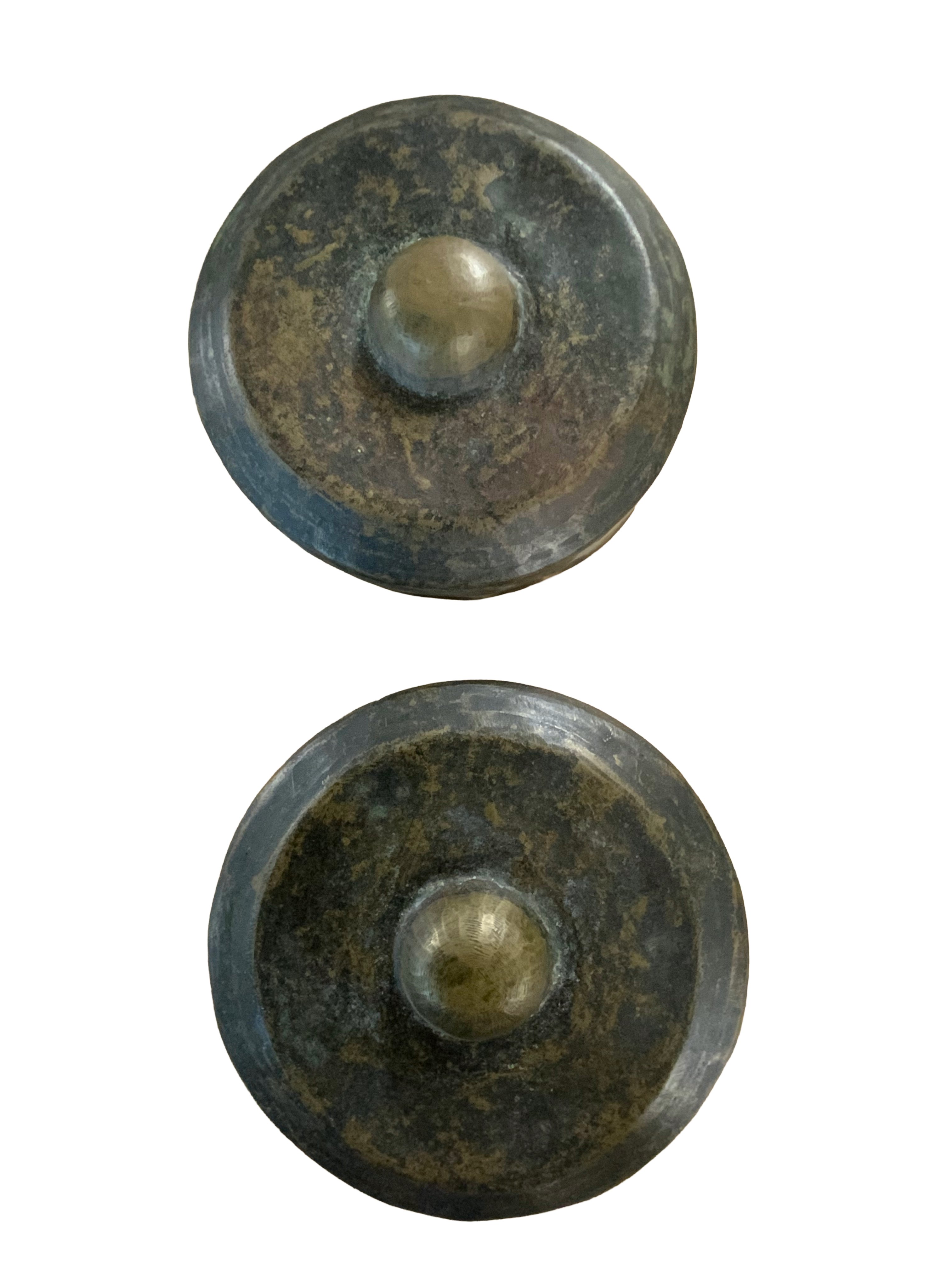 A pair of matching bronze Gongs. 22cm